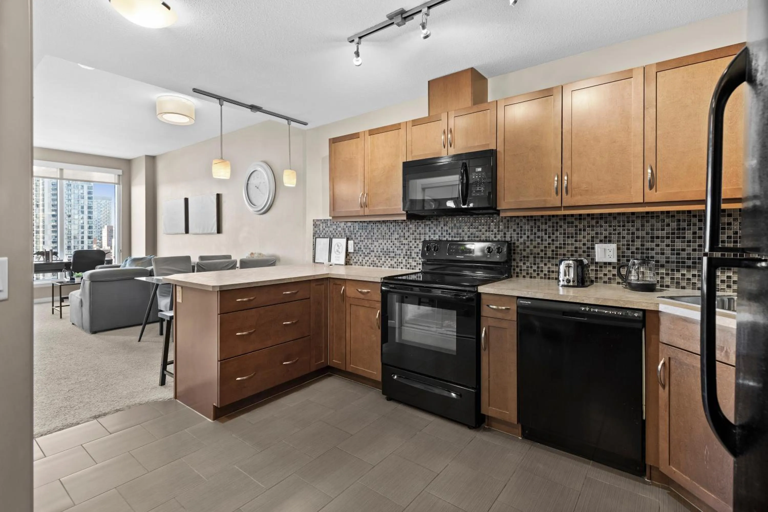 Kitchen or kitchenette in GlobalStay Downtown Calgary Condos