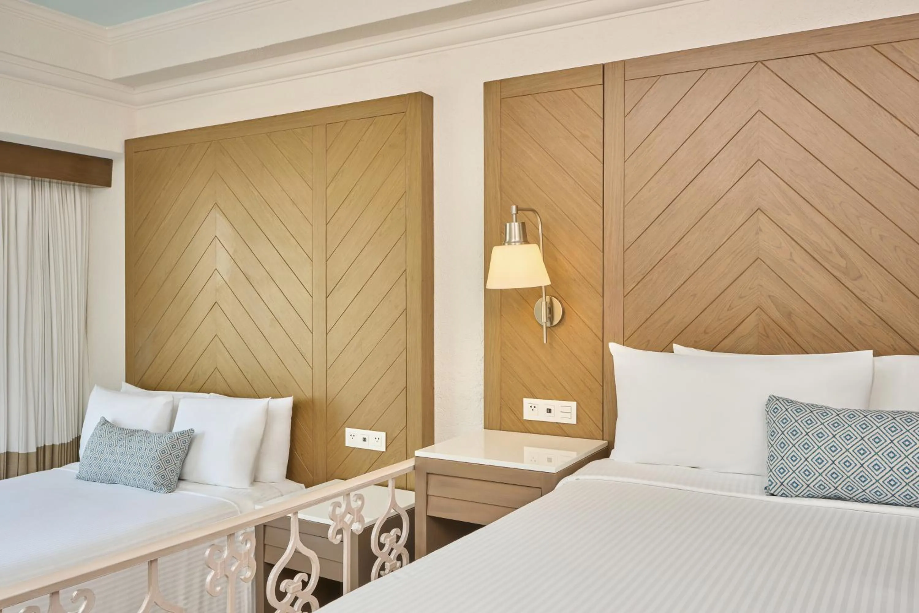 Bed in Sunscape Cancun All-Inclusive Resort & Spa by Hyatt