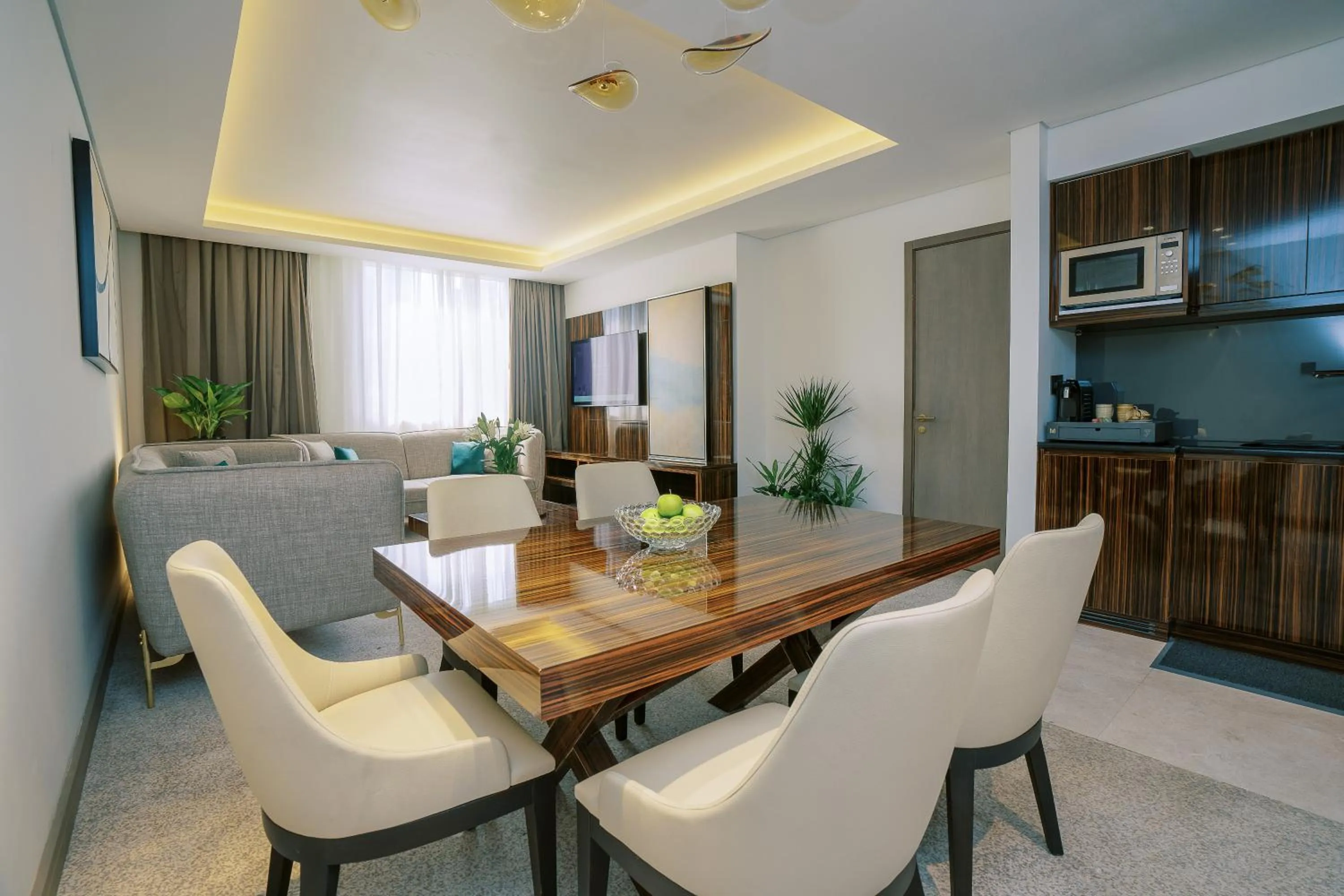 Communal lounge/ TV room in Khalidia Palace Hotel Dubai by Mourouj Gloria