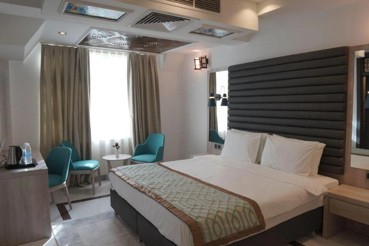 Bedroom, Bed in Noor Land Hotel