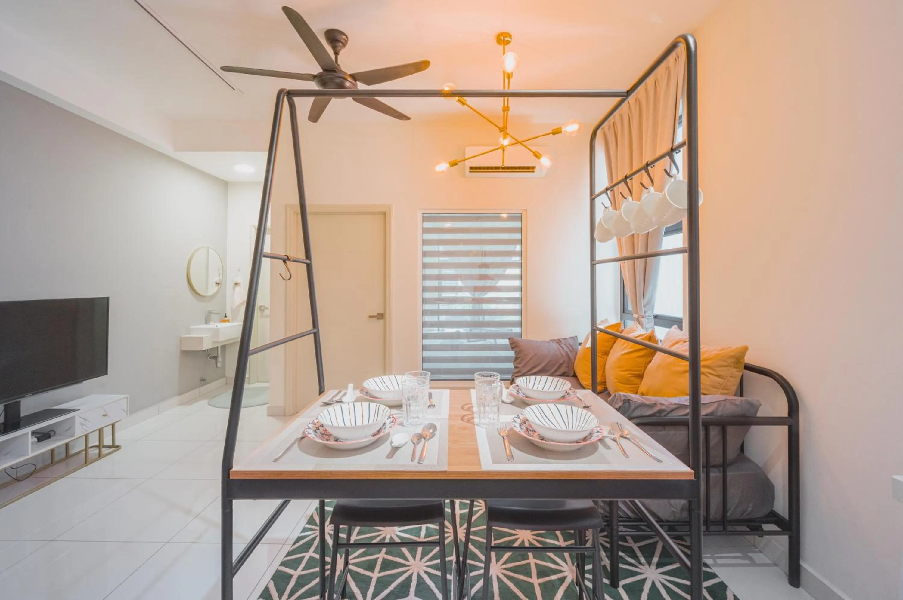 Living room, Bed in Arte Mont Kiara by Airhost