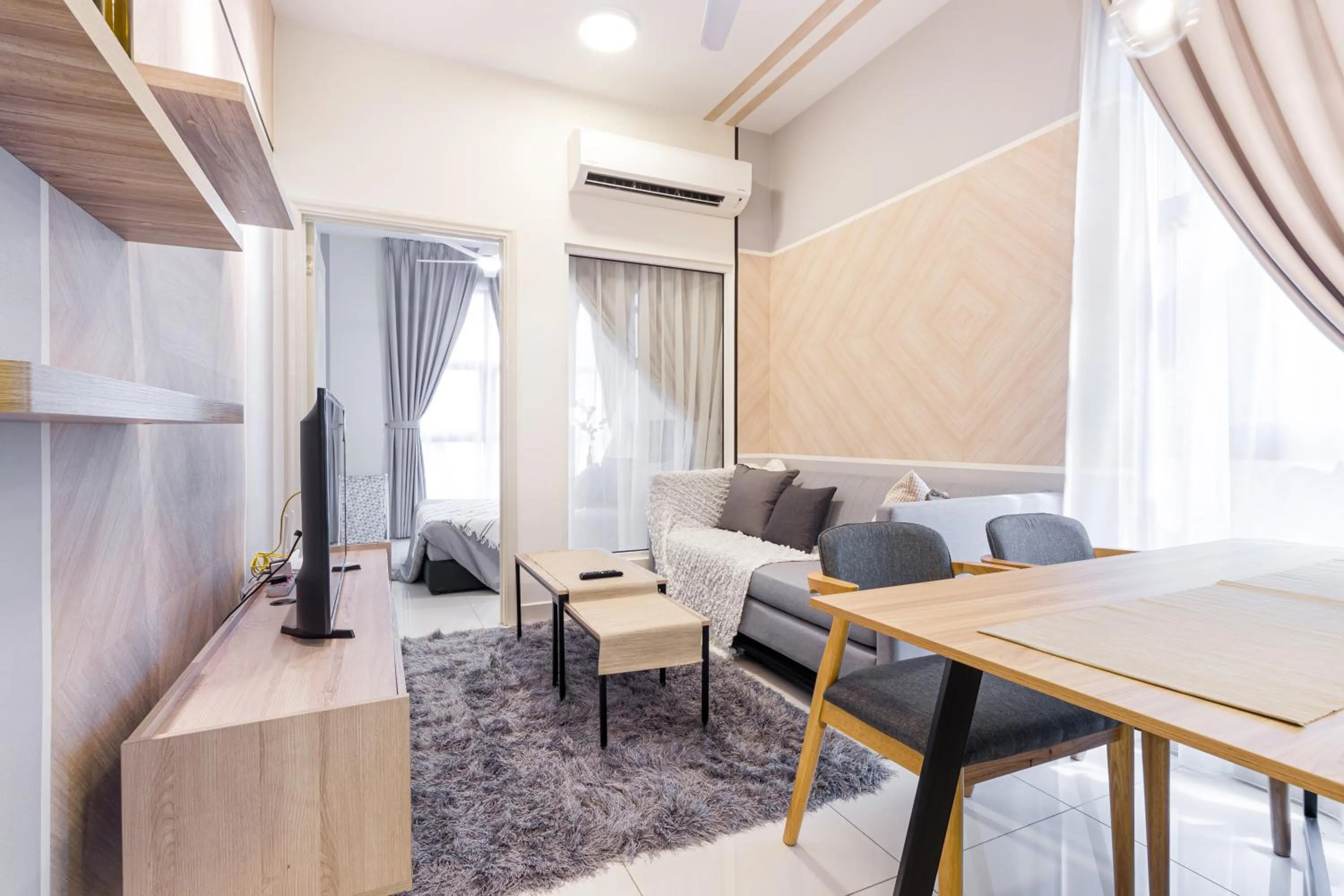 Living room in Arte Mont Kiara by Airhost