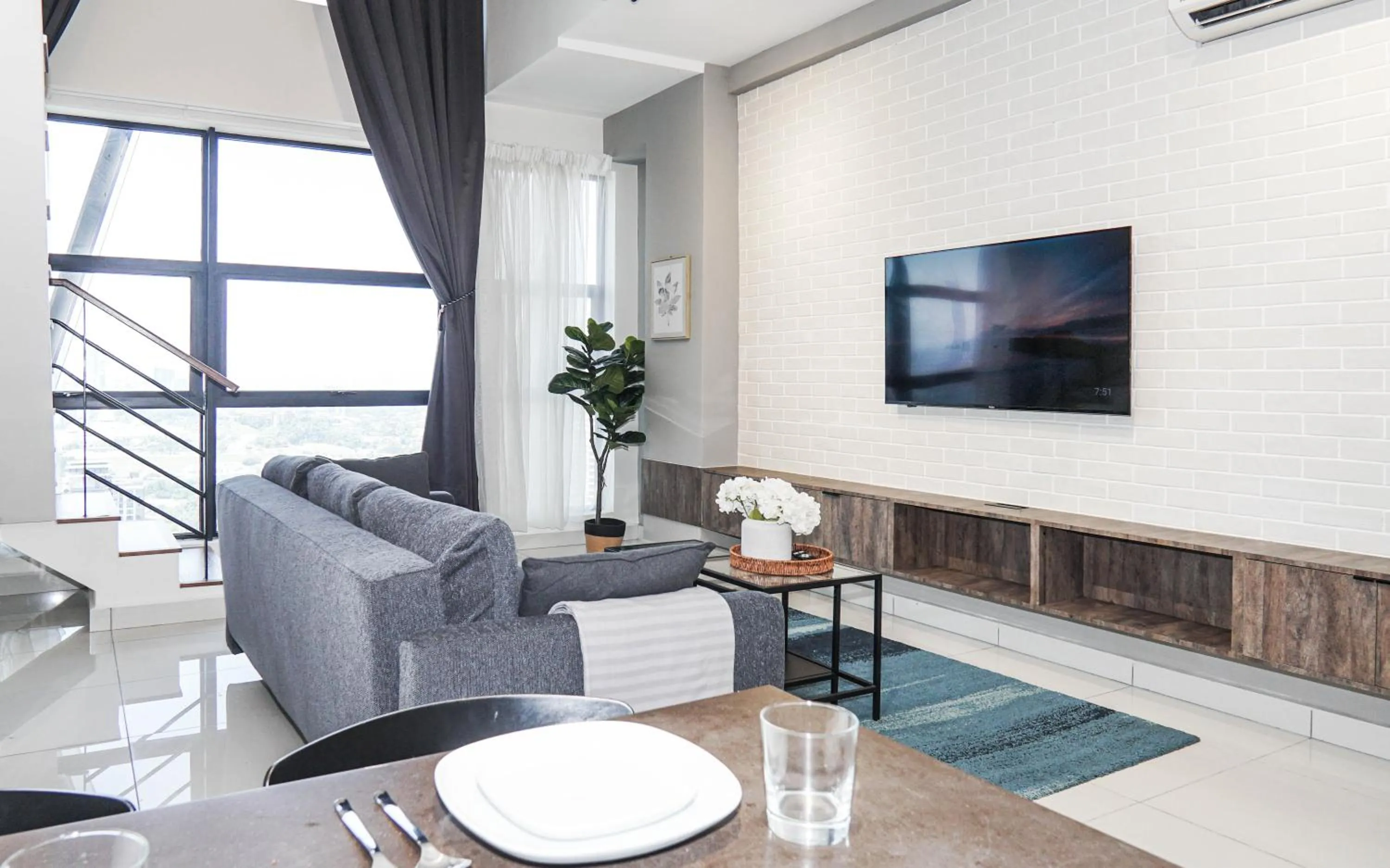 Living room in Arte Mont Kiara by Airhost