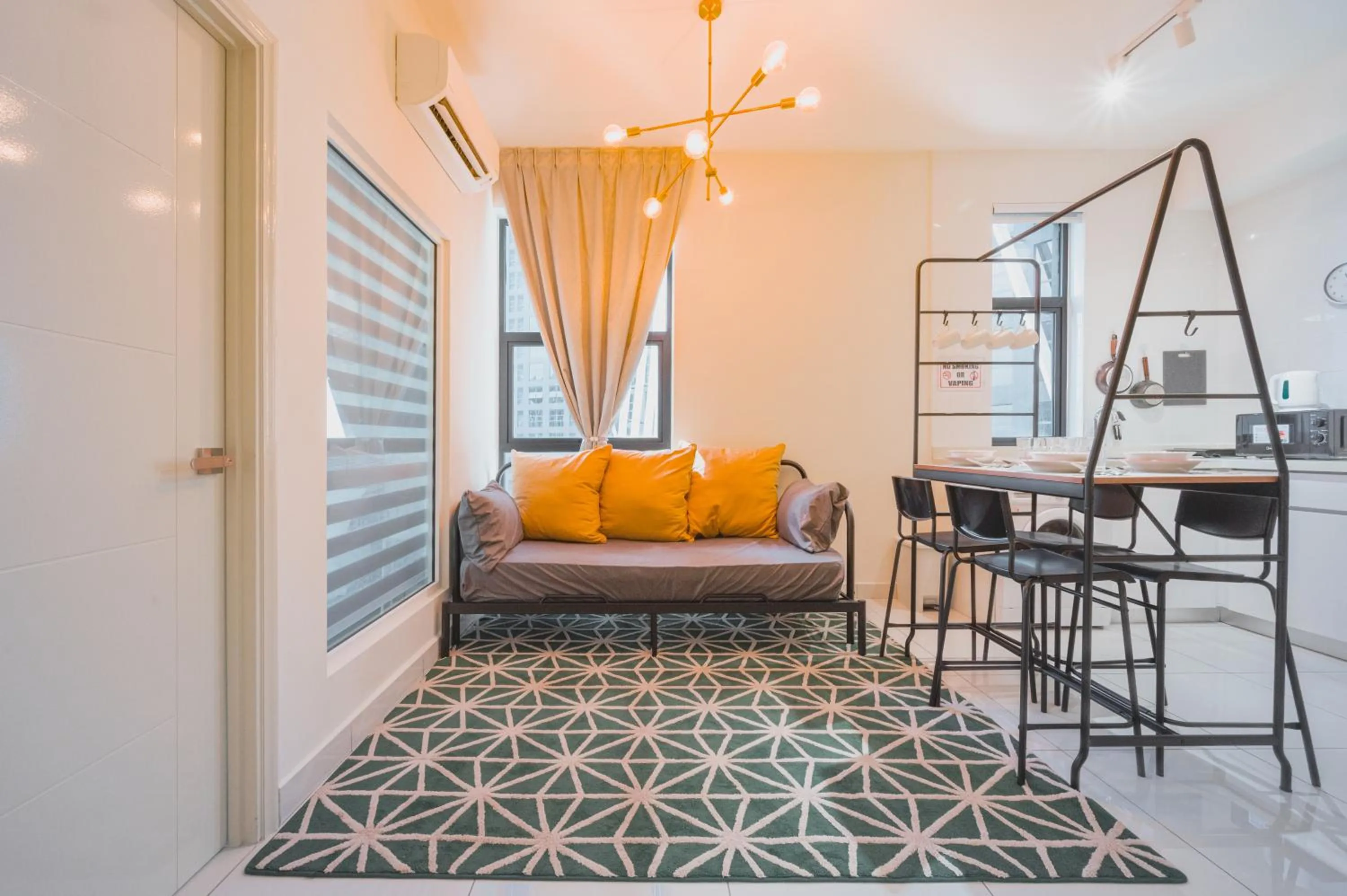 Living room in Arte Mont Kiara by Airhost