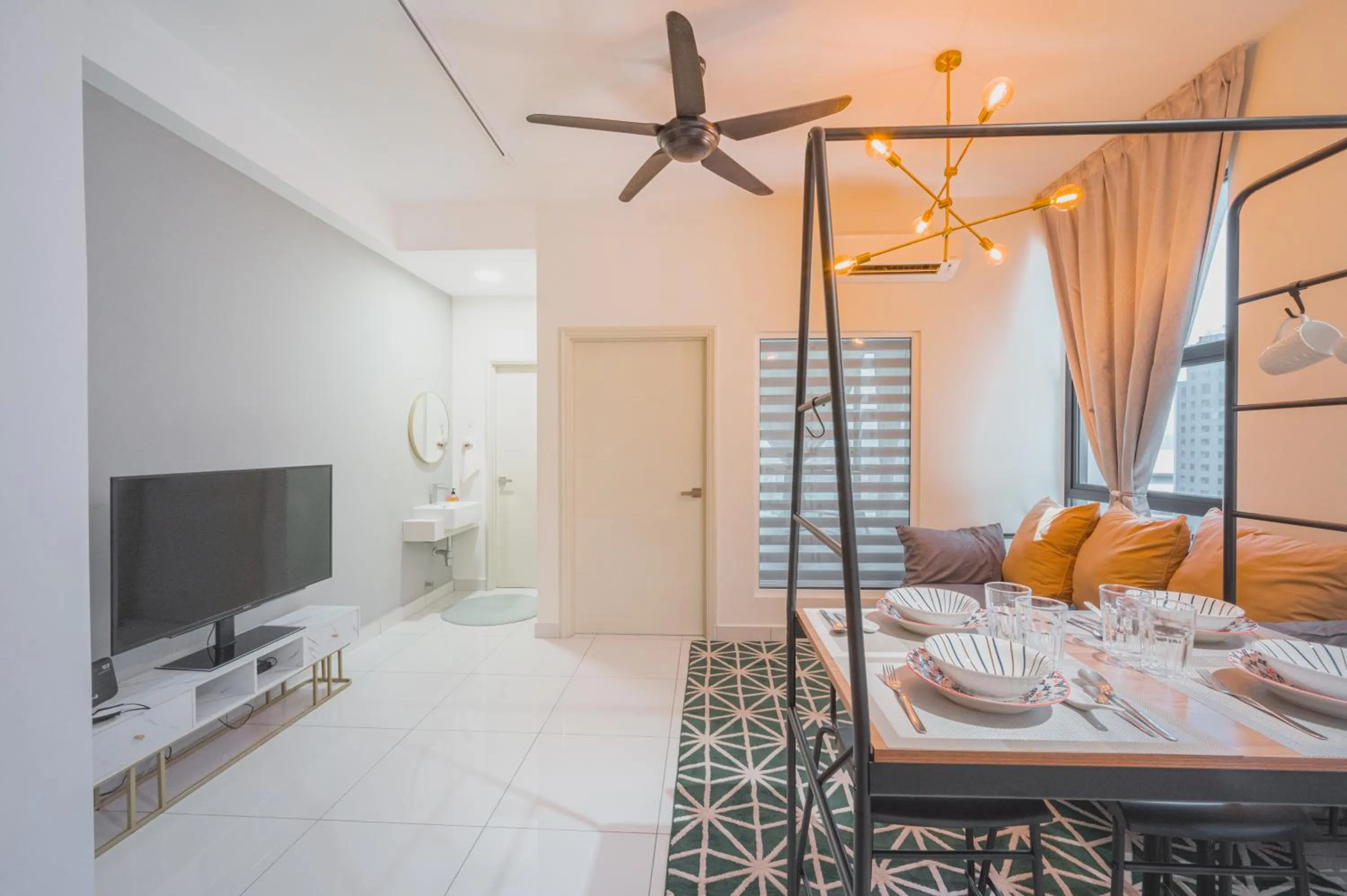 Living room, Bed in Arte Mont Kiara by Airhost