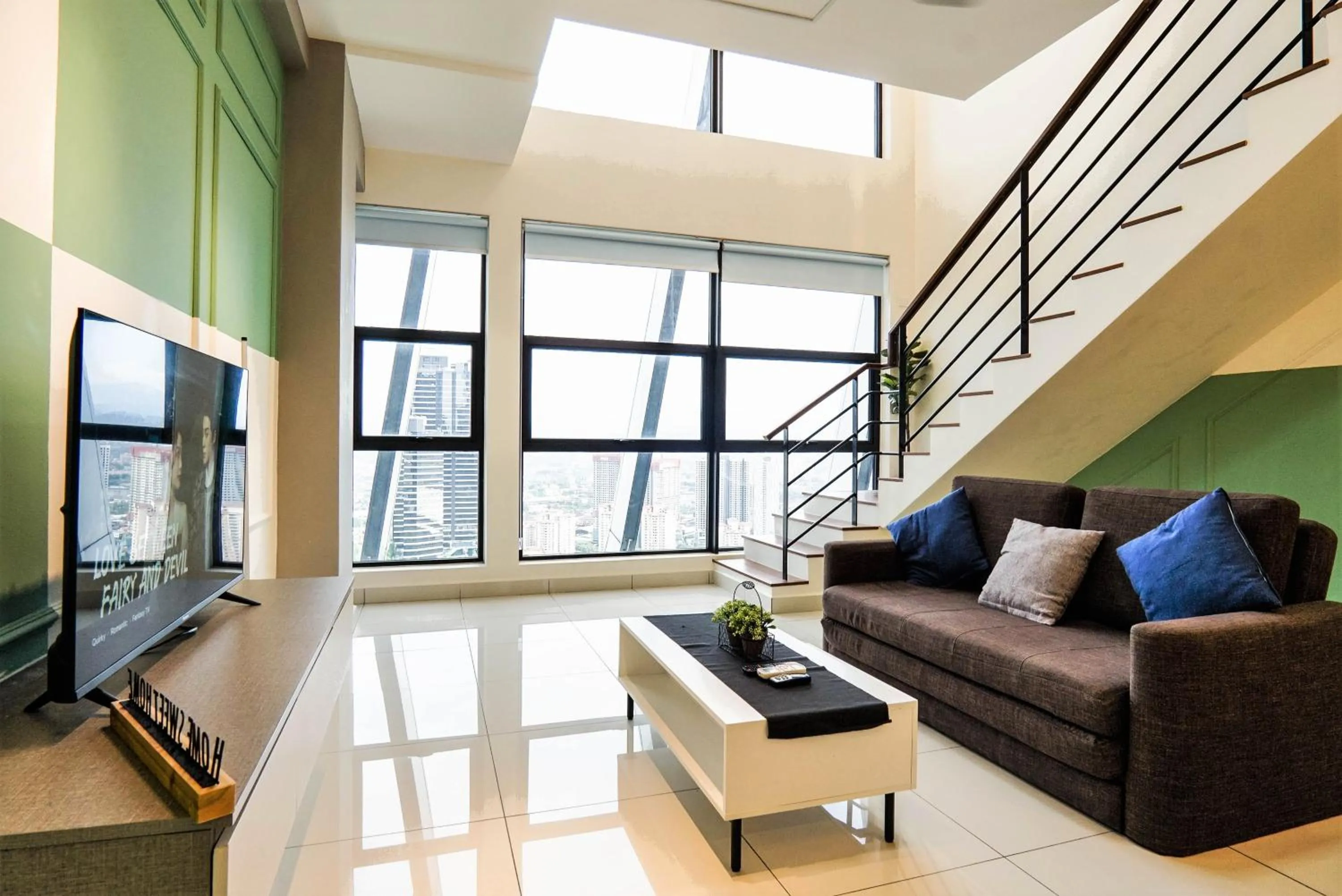 Living room in Arte Mont Kiara by Airhost