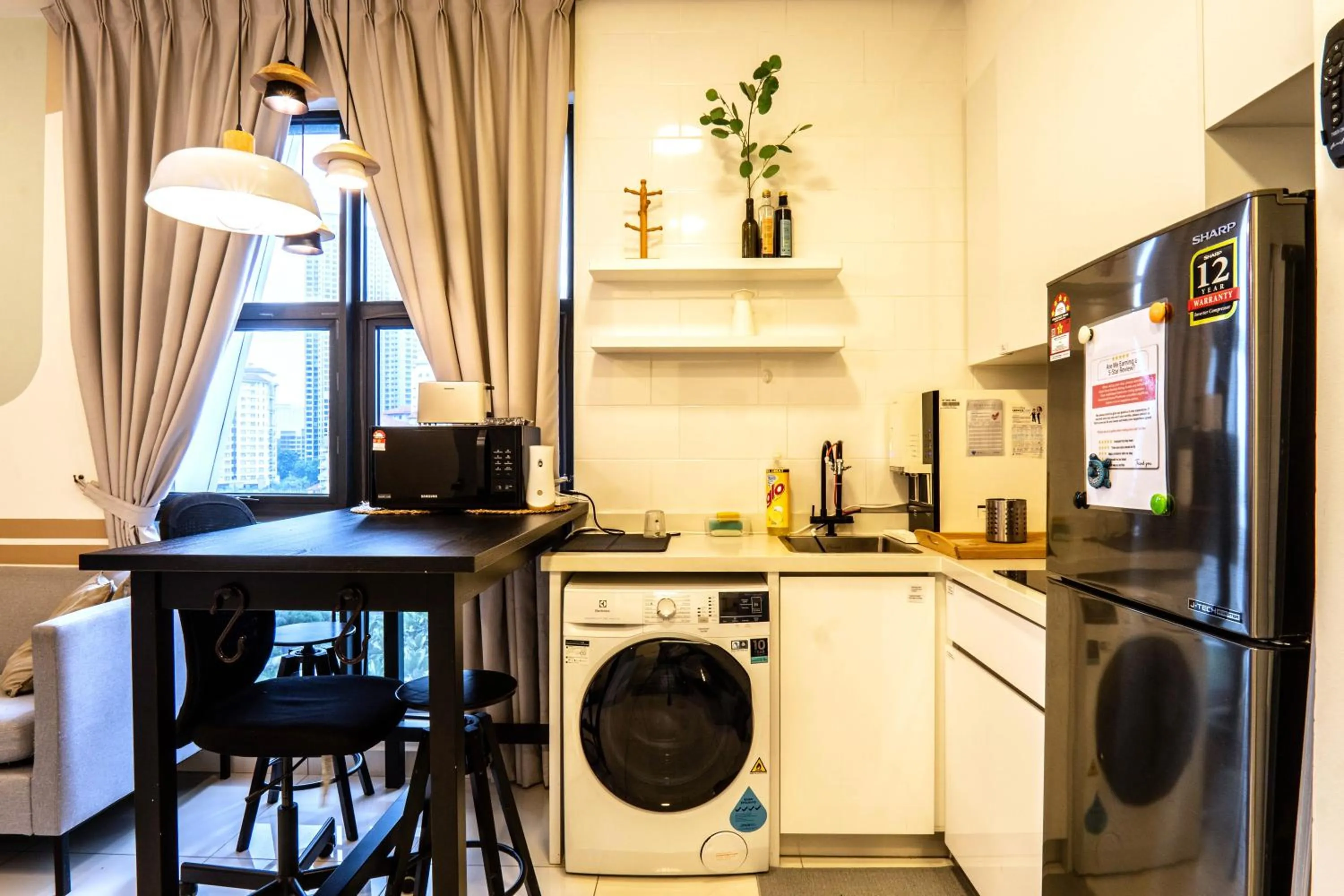 Kitchen or kitchenette in Arte Mont Kiara by Airhost