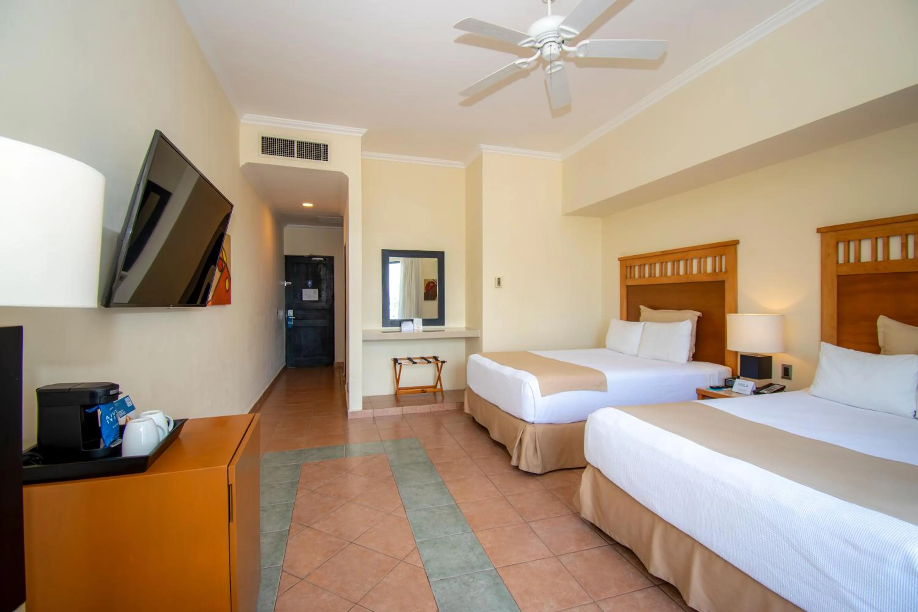 Photo of the whole room, Bed in Hotel NYX Cancun