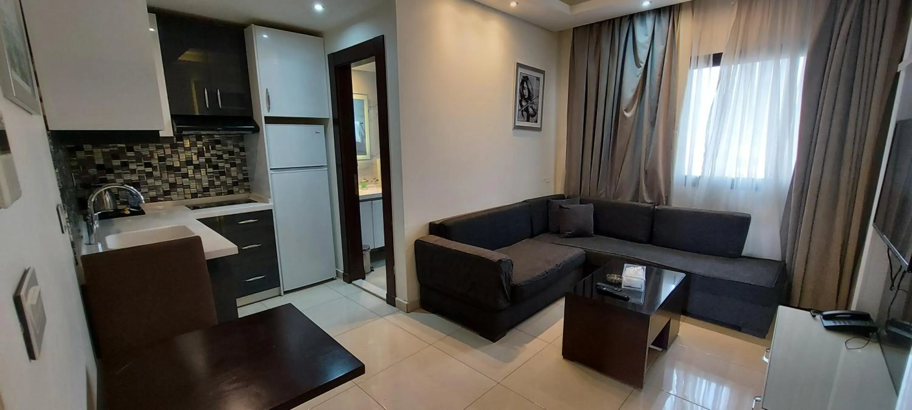 Kitchen or kitchenette in Palm Ville Suites