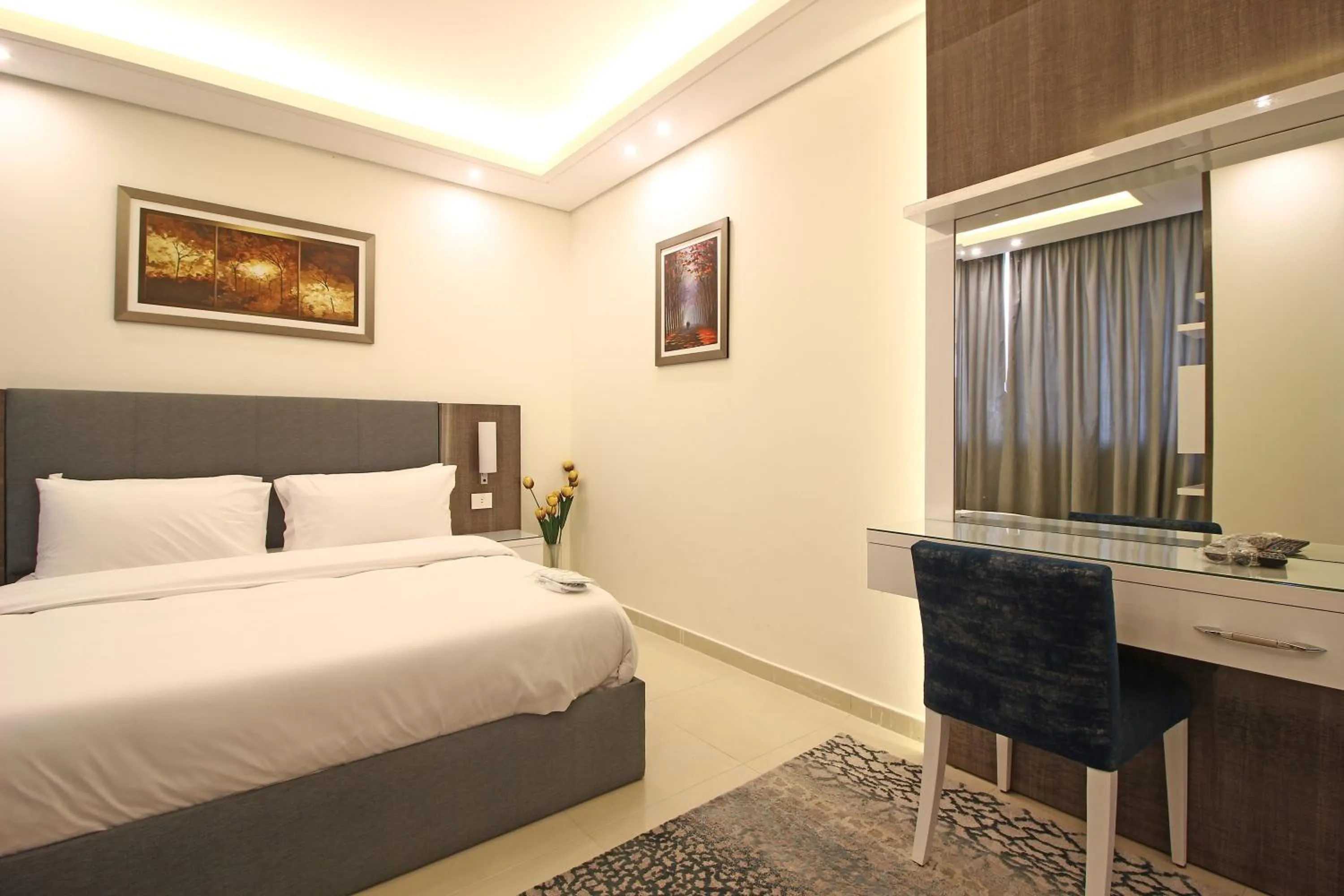 Bed in Palm Ville Suites