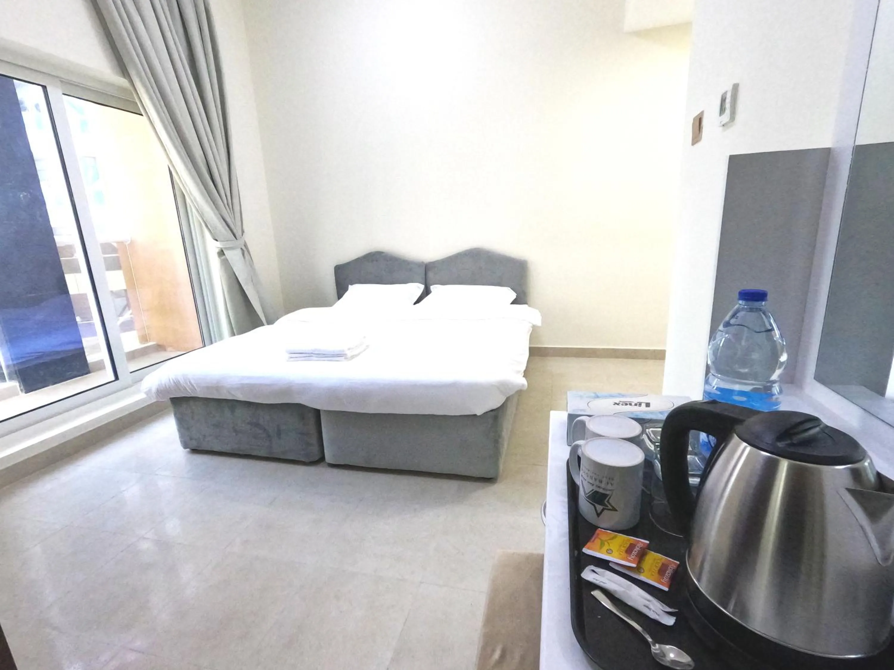 Bedroom in Barsha Star Residence - Home Stay