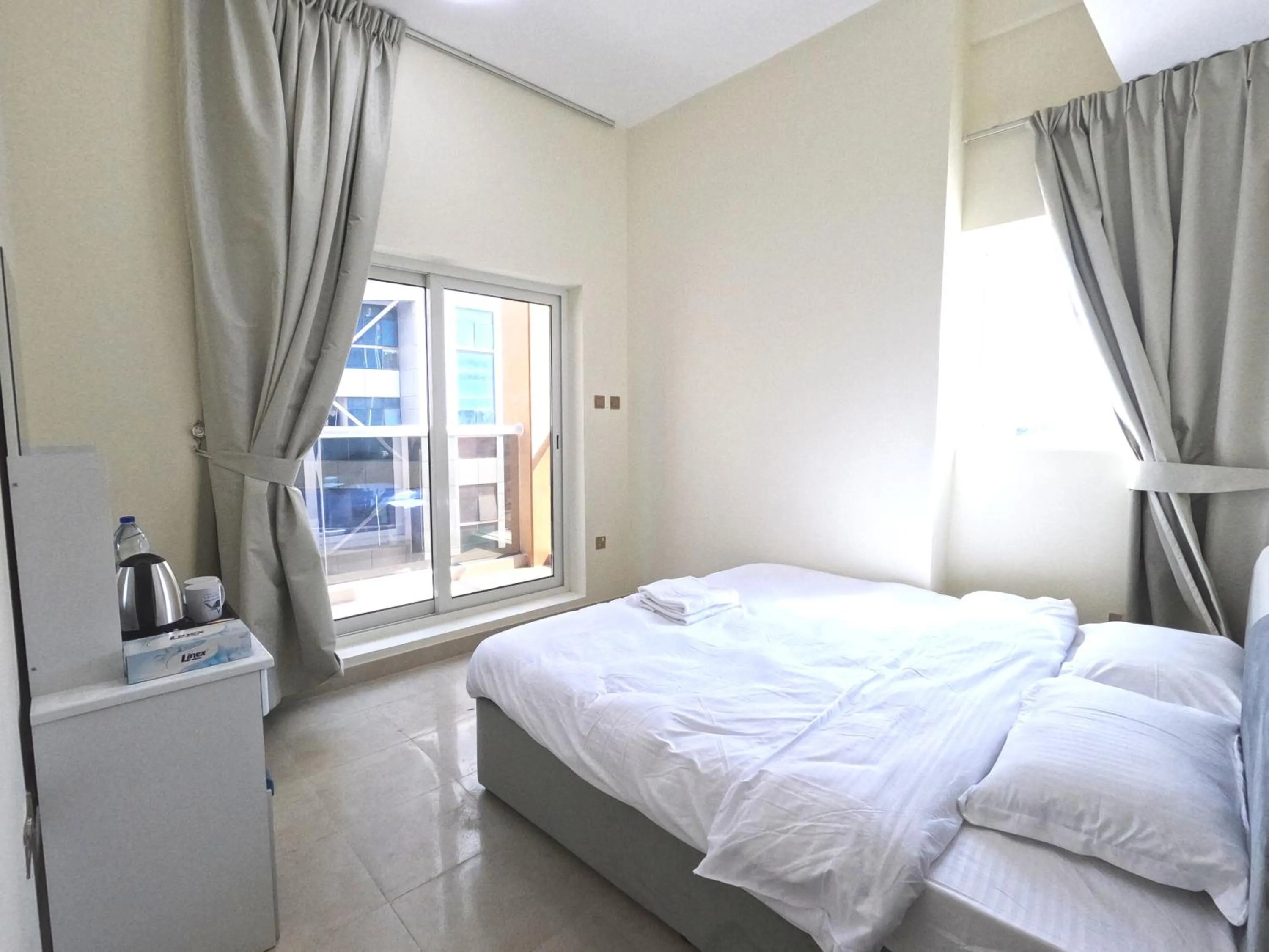 Bedroom in Barsha Star Residence - Home Stay