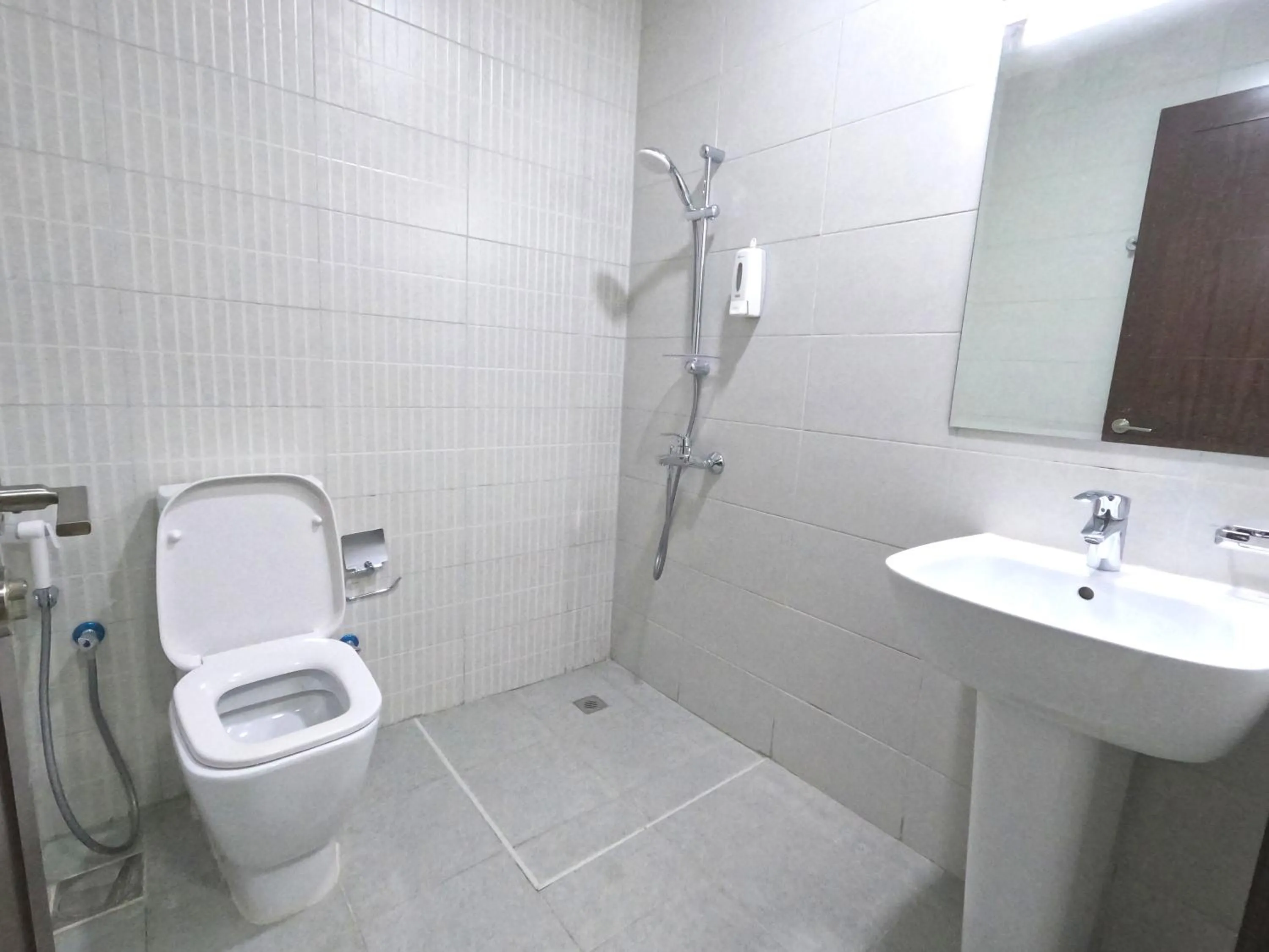 Bathroom in Barsha Star Residence - Home Stay