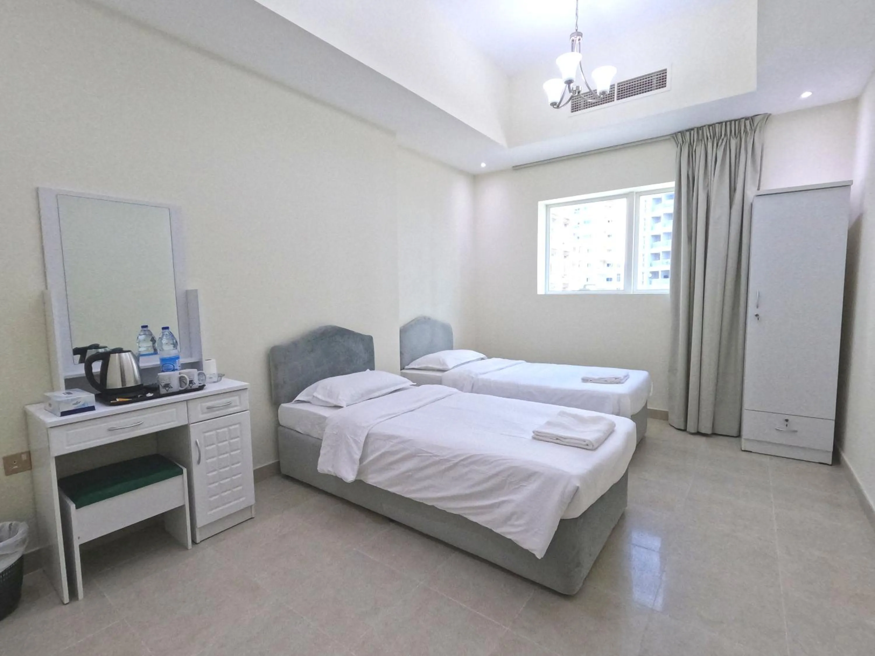 Bedroom in Barsha Star Residence - Home Stay