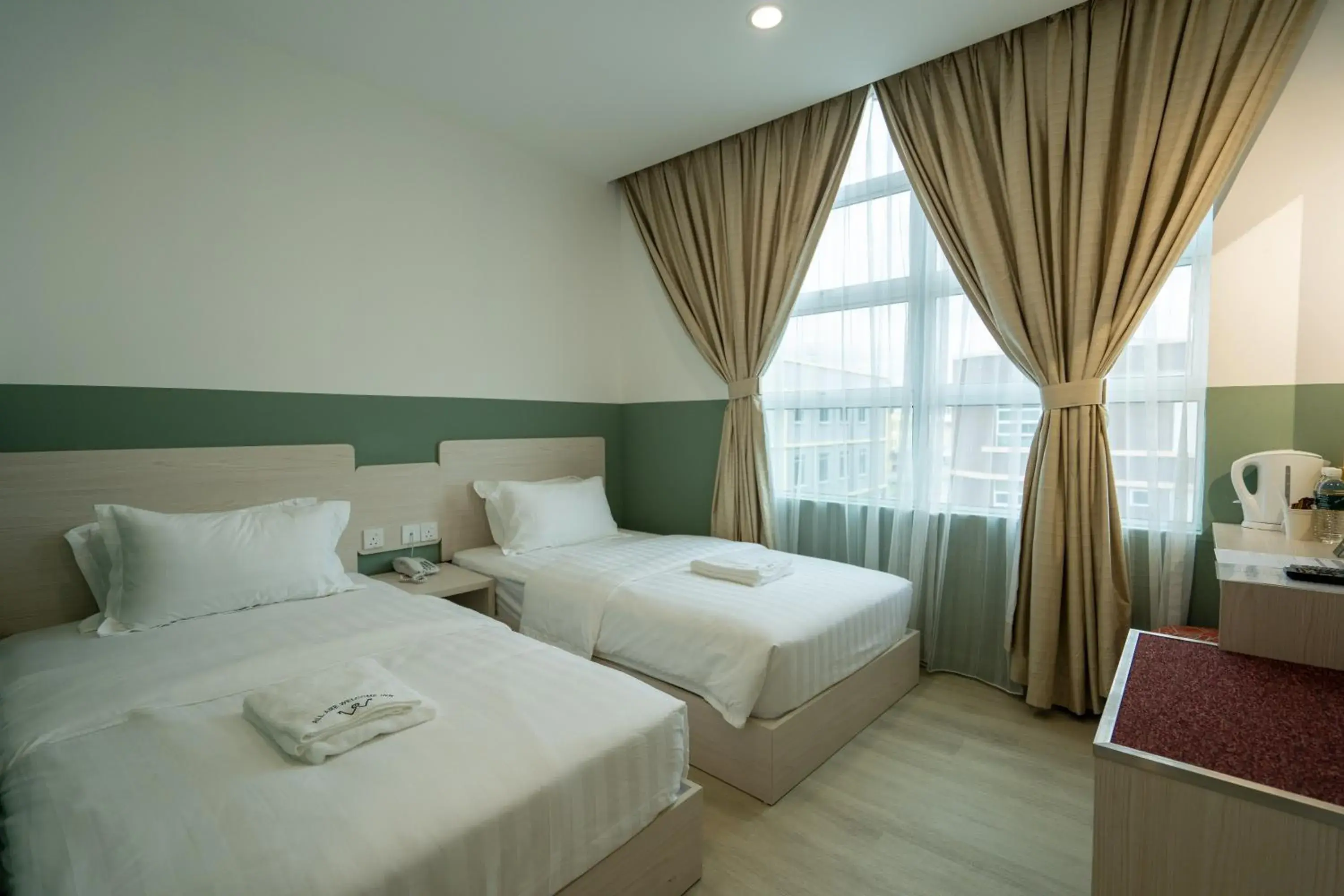 Premium Twin Room in All Are Welcome Lawas Boutique Hotel Premium Twin Room in All Are Welcome Lawas Boutique Hotel