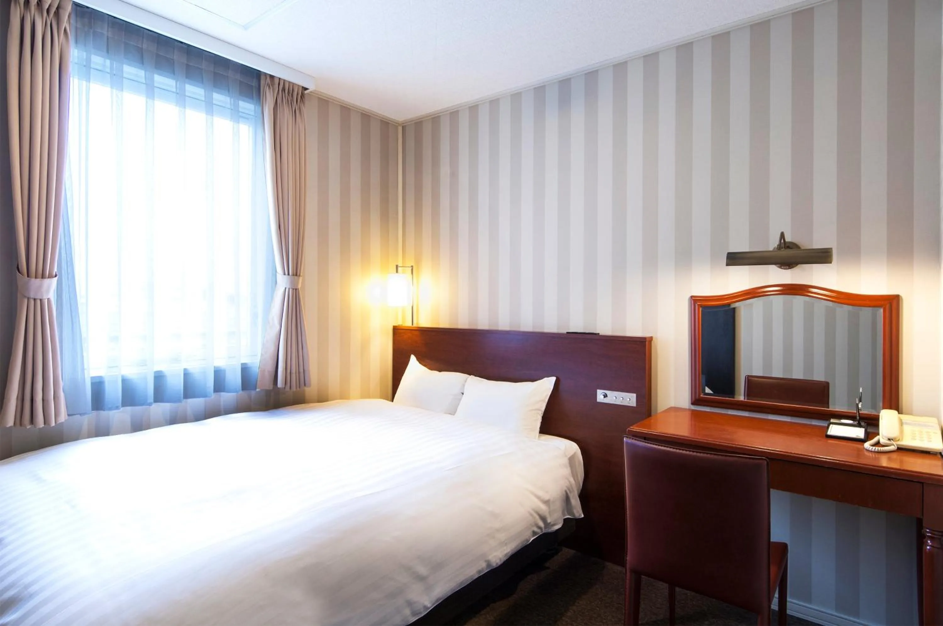 Photo of the whole room, Bed in TsukubaNoYu Urban Hotel