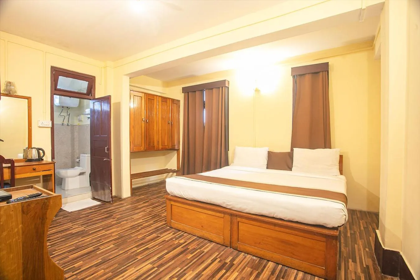 Bedroom in Magpie Mall Road Residency (MG Marg)