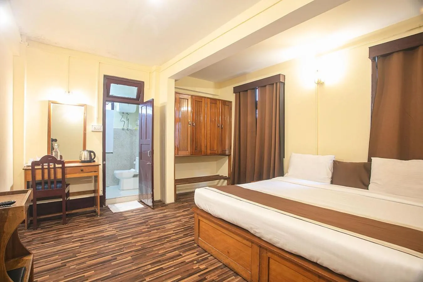 Bedroom in Magpie Mall Road Residency (MG Marg)