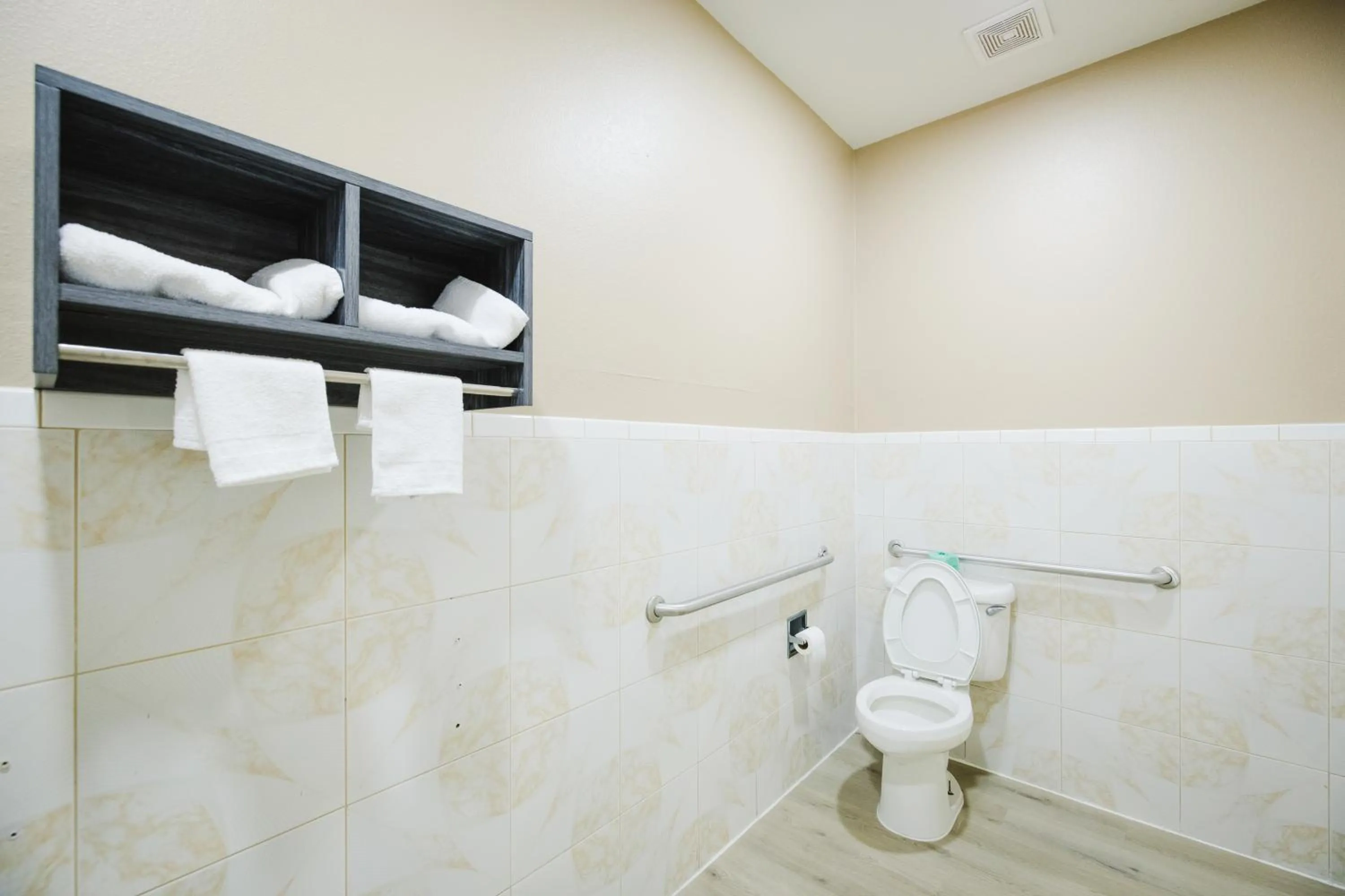 Toilet in Sapphire Inn & Suites