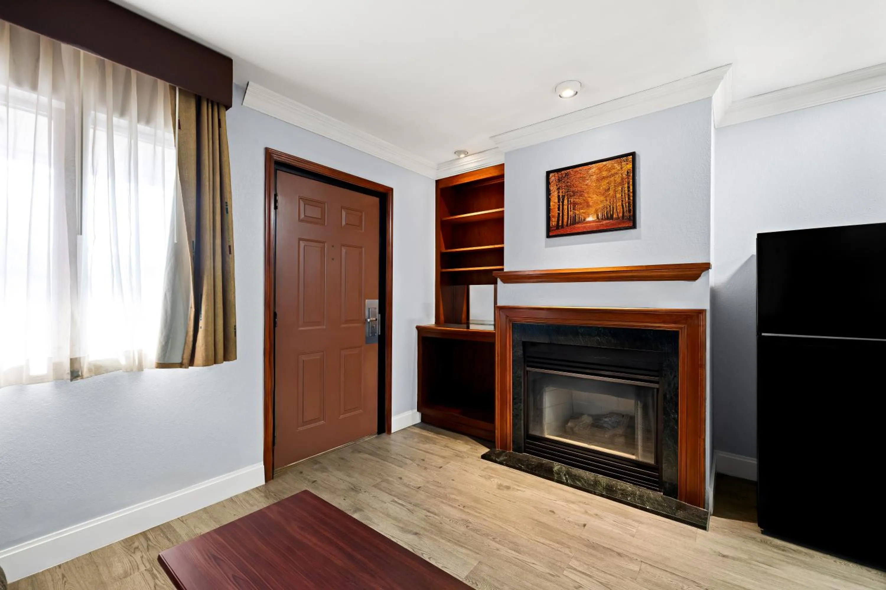 fireplace in Village Haven Inn & Extended Stay