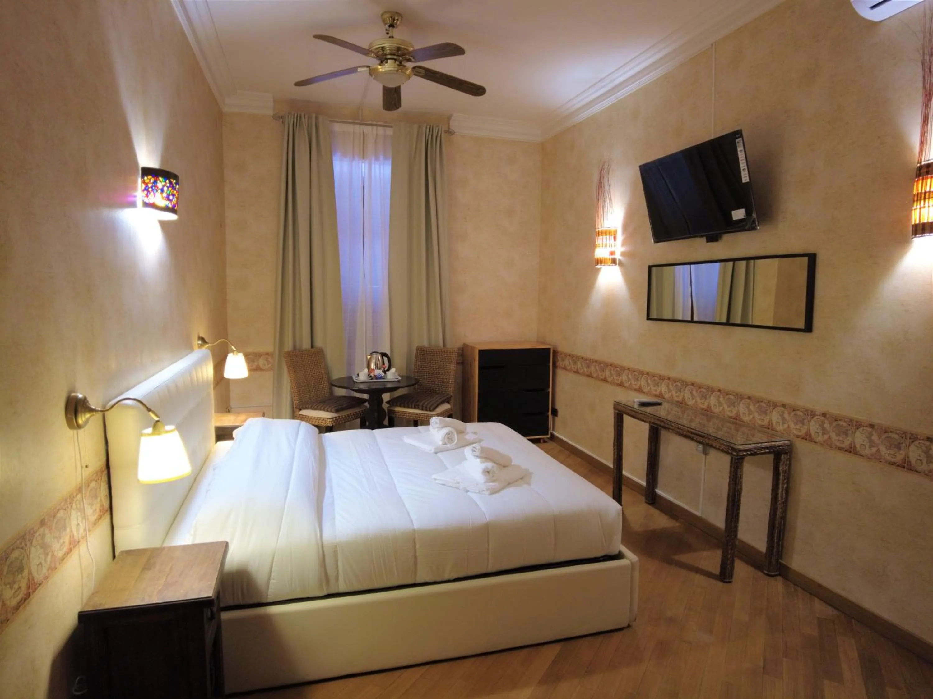 Bed in Gardoce's Guest House