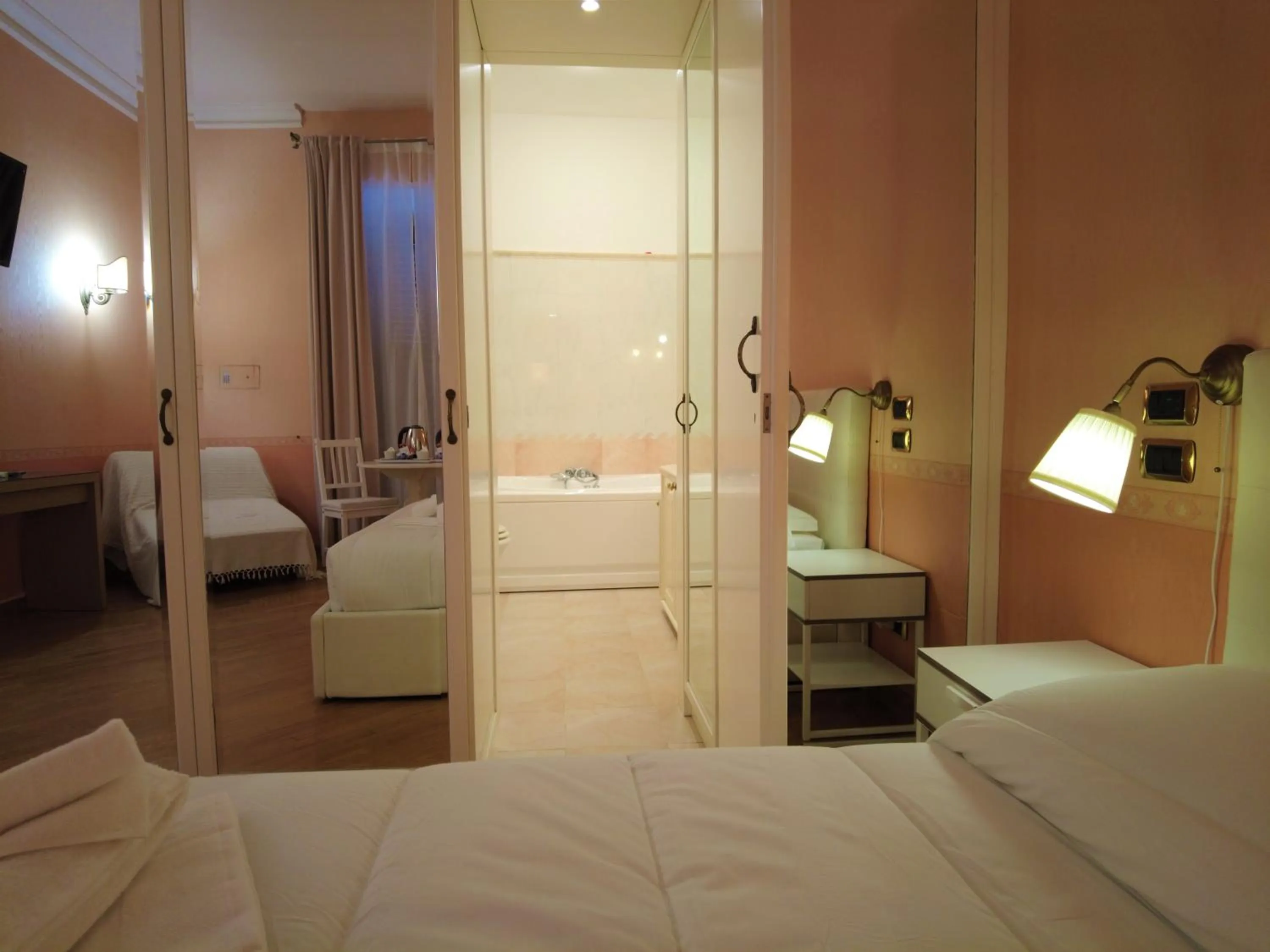 Bed in Gardoce's Guest House