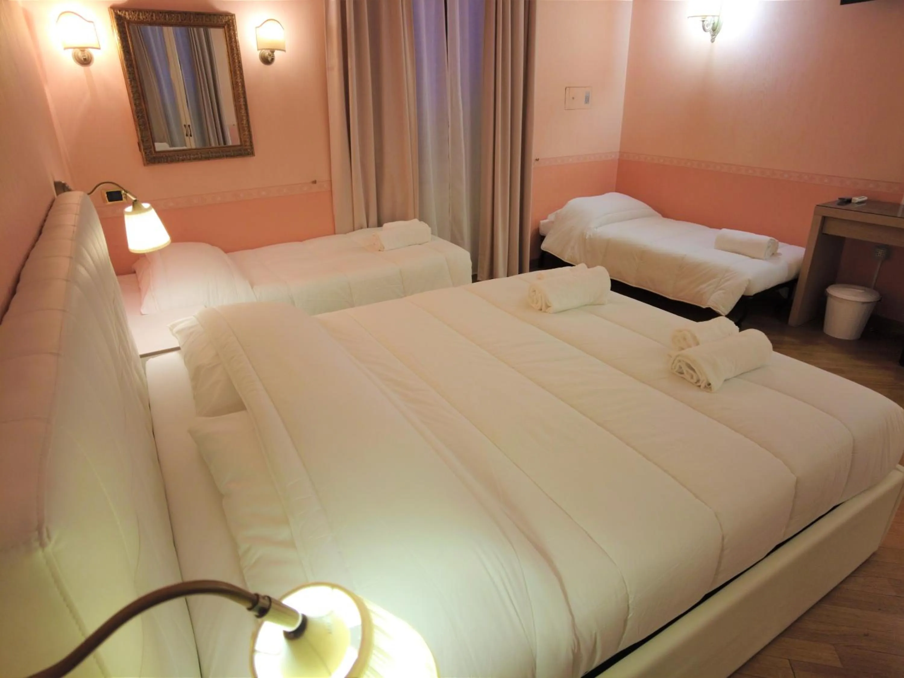 Bed in Gardoce's Guest House