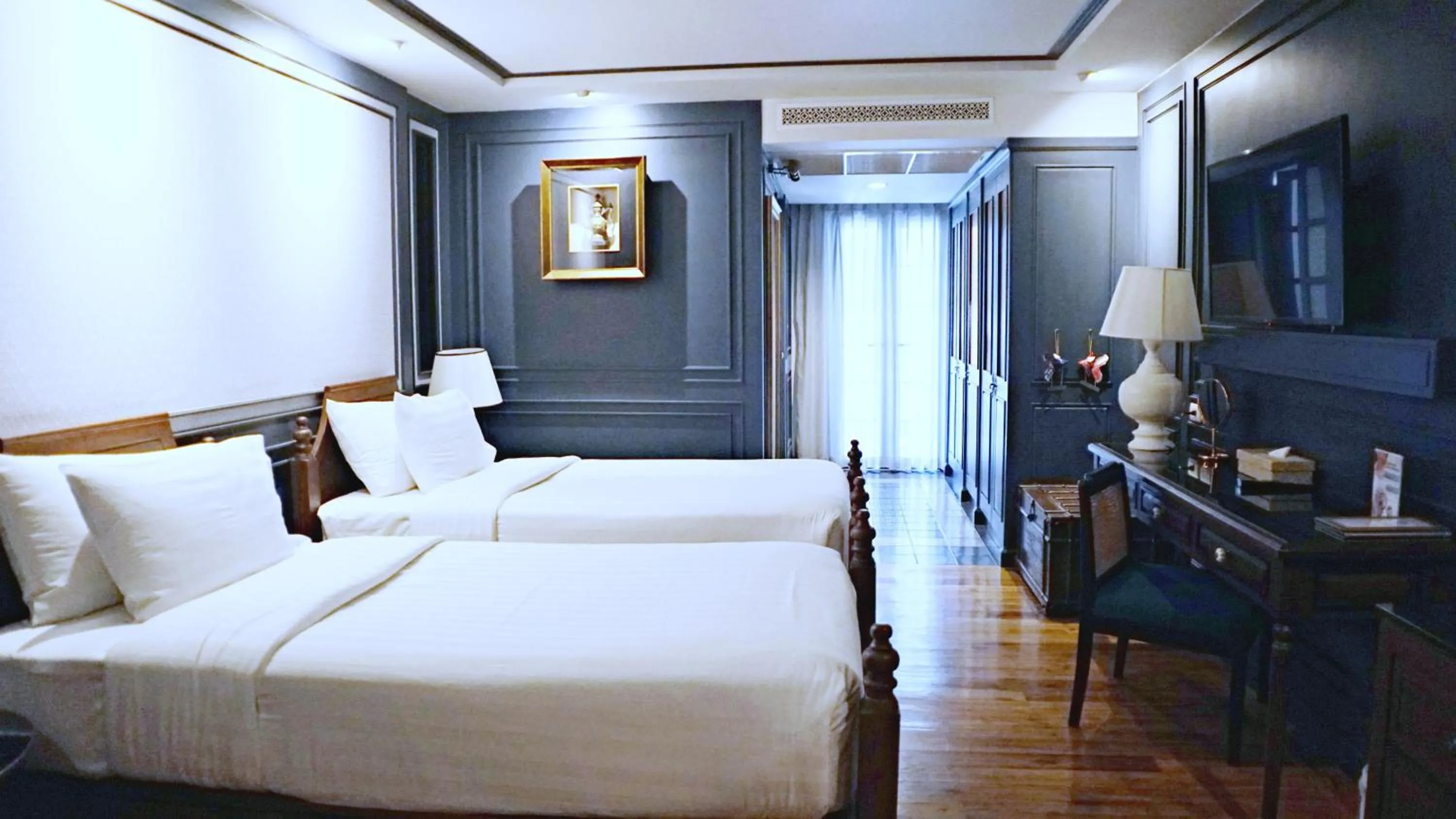 Bed in Buri Sriping Riverside Resort & Spa