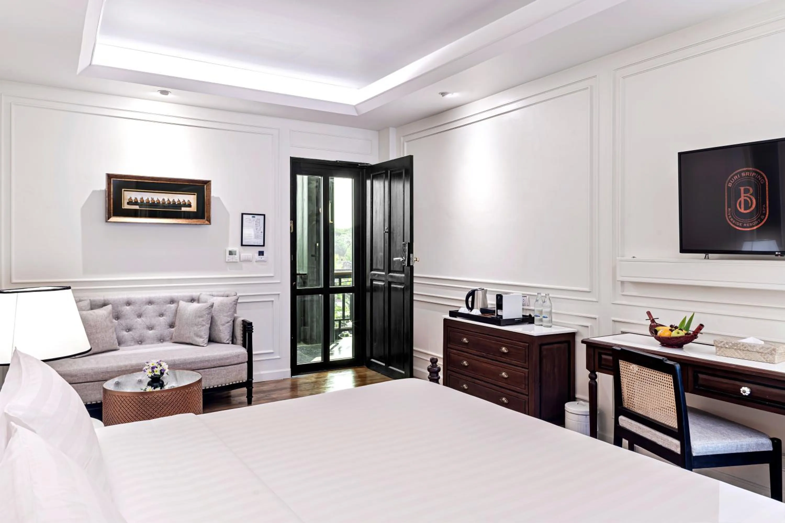 Bed in Buri Sriping Riverside Resort & Spa