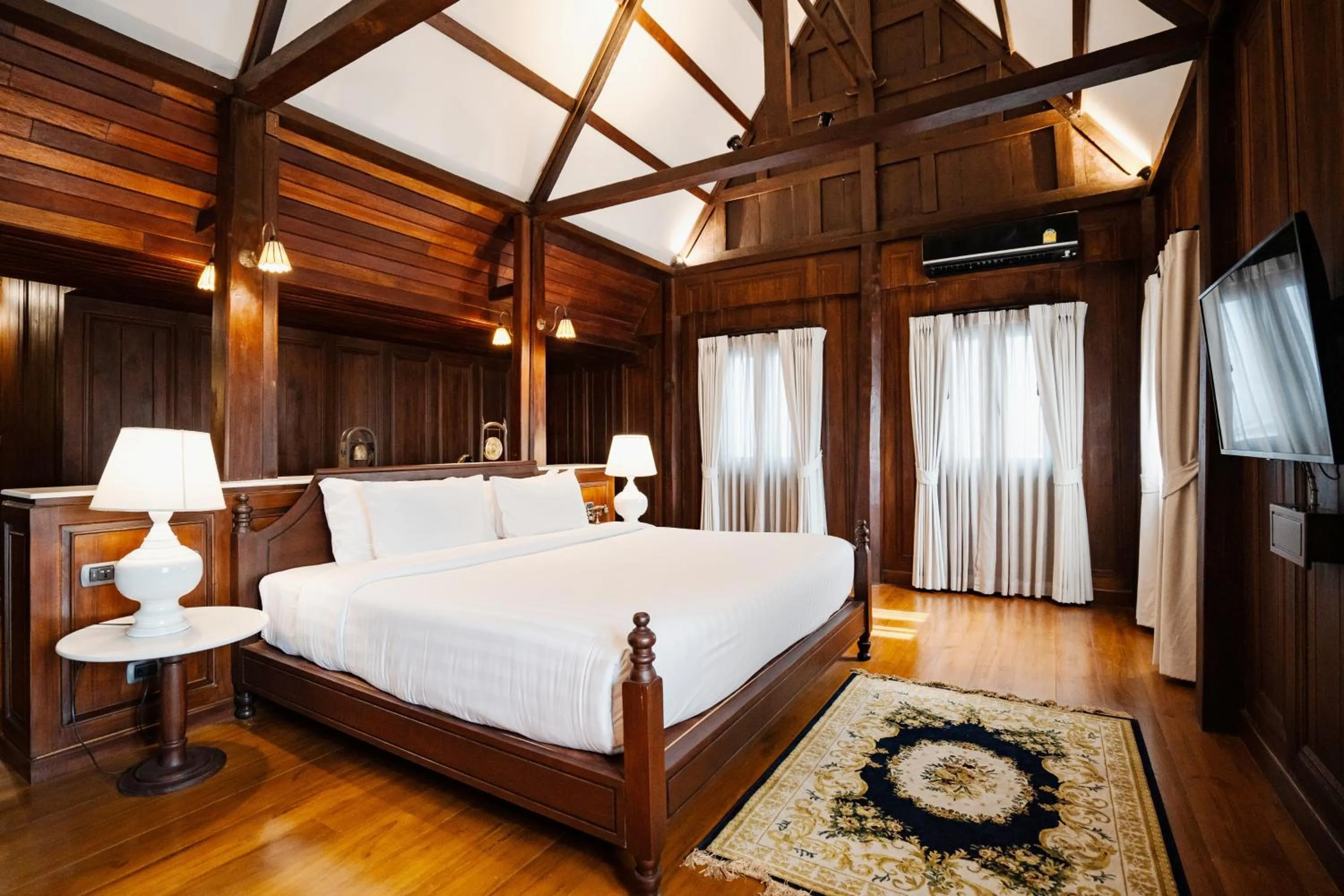 Bed in Buri Sriping Riverside Resort & Spa