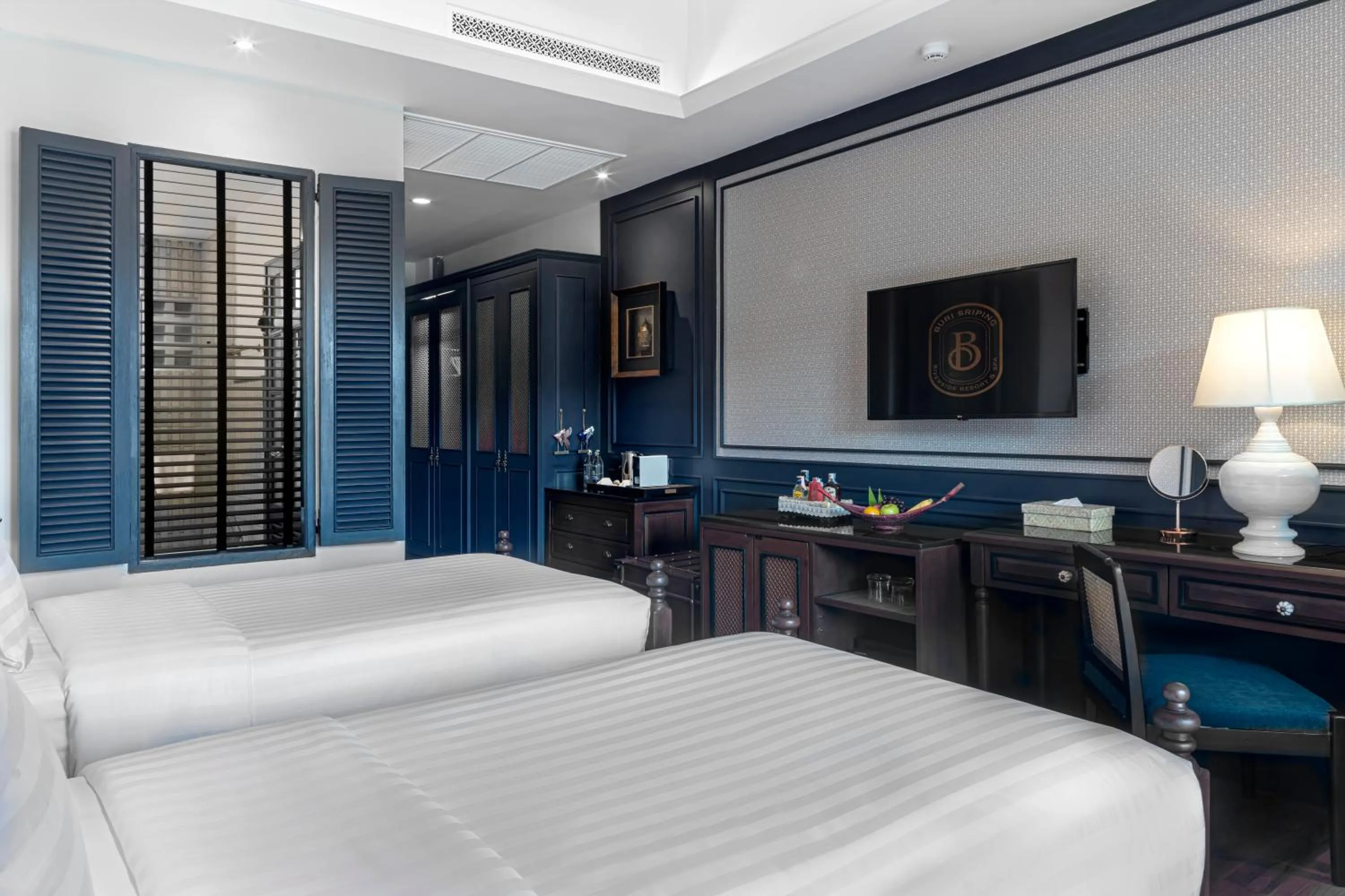 Bed in Buri Sriping Riverside Resort & Spa