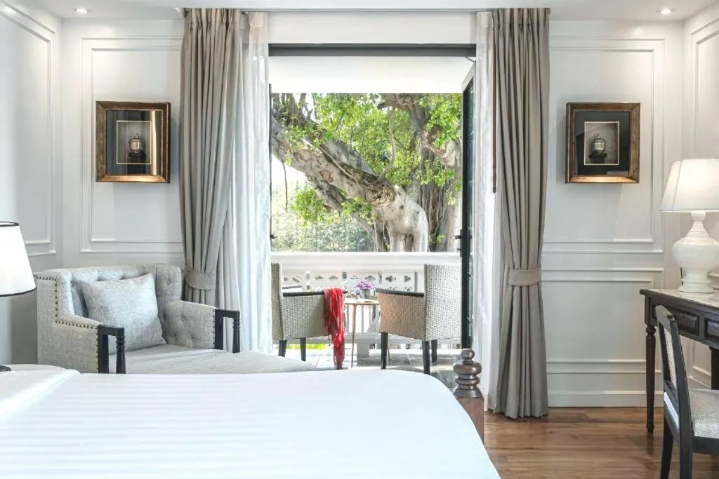 Bed in Buri Sriping Riverside Resort & Spa