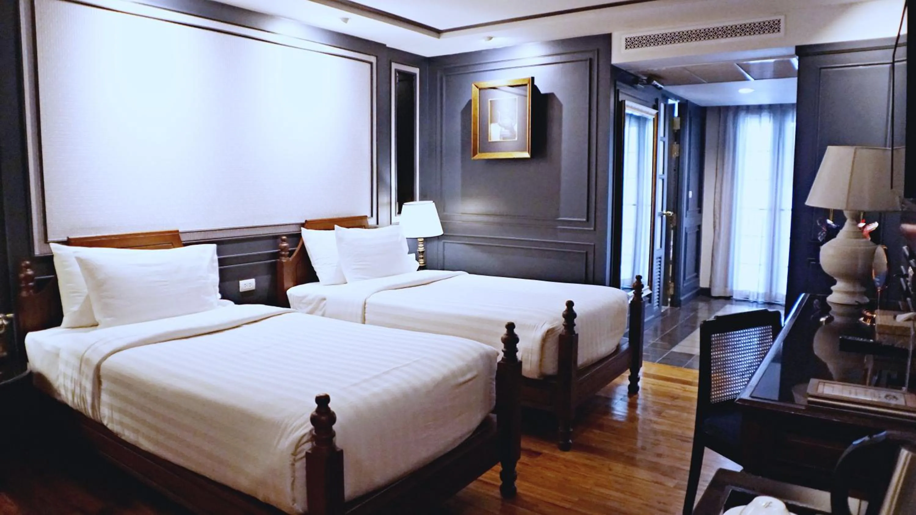 Bed in Buri Sriping Riverside Resort & Spa