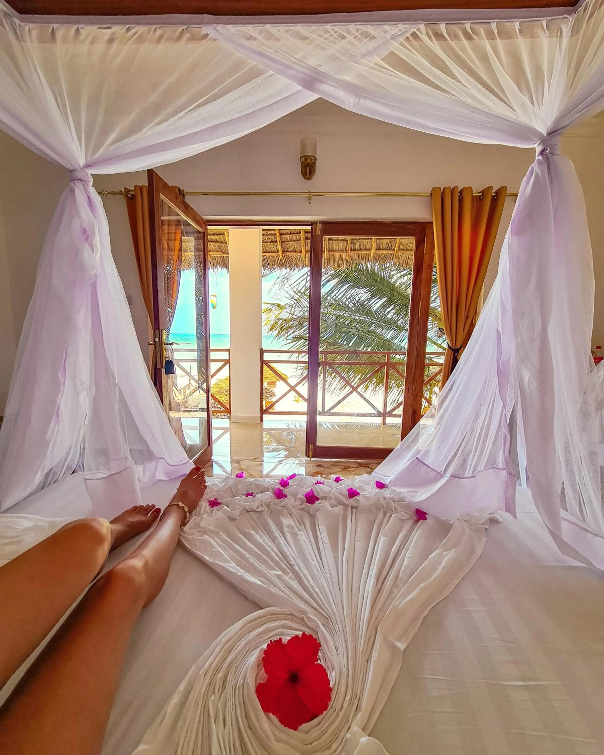 Bed in Karibu Beach Resort