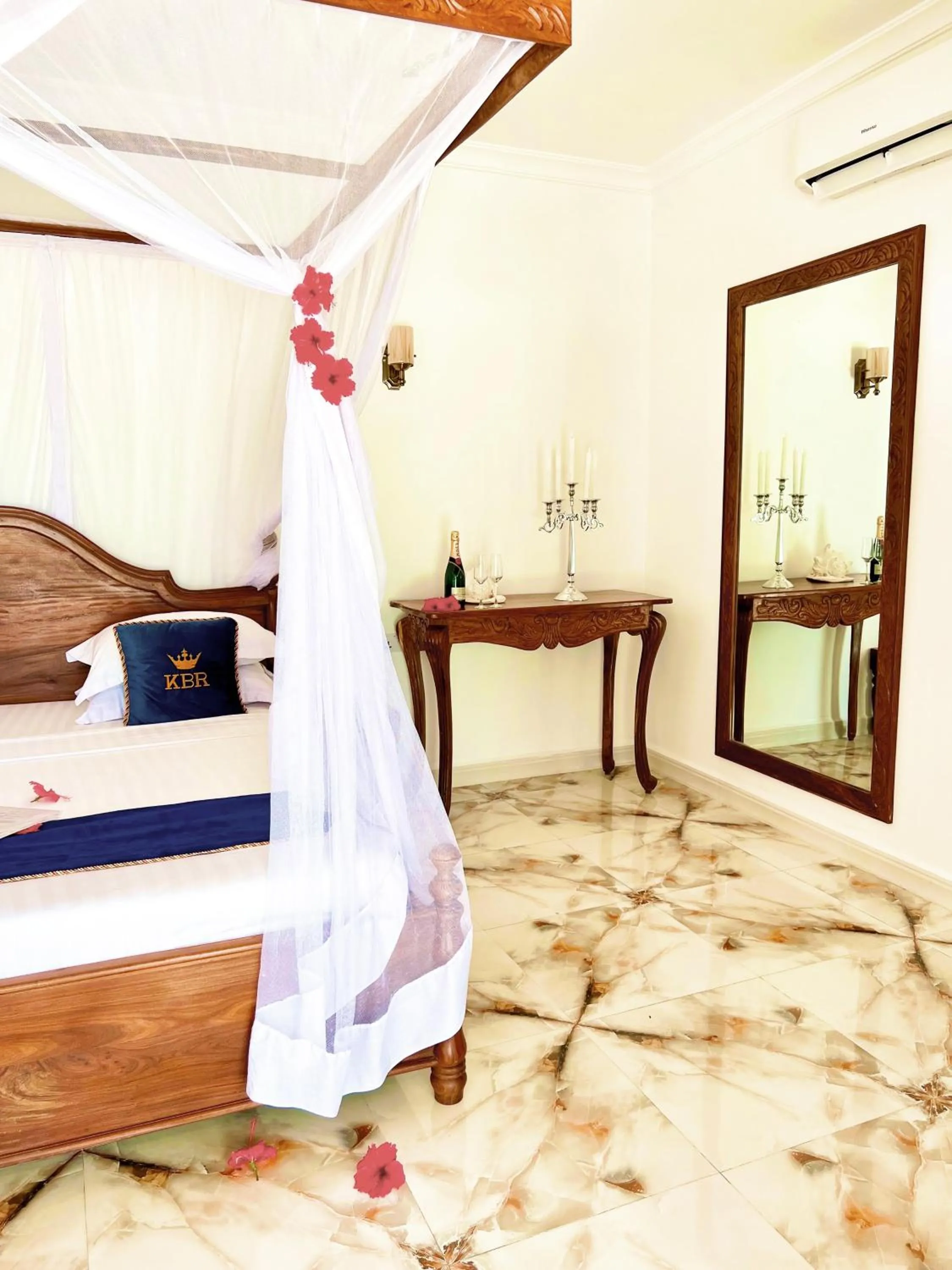 Bed in Karibu Beach Resort