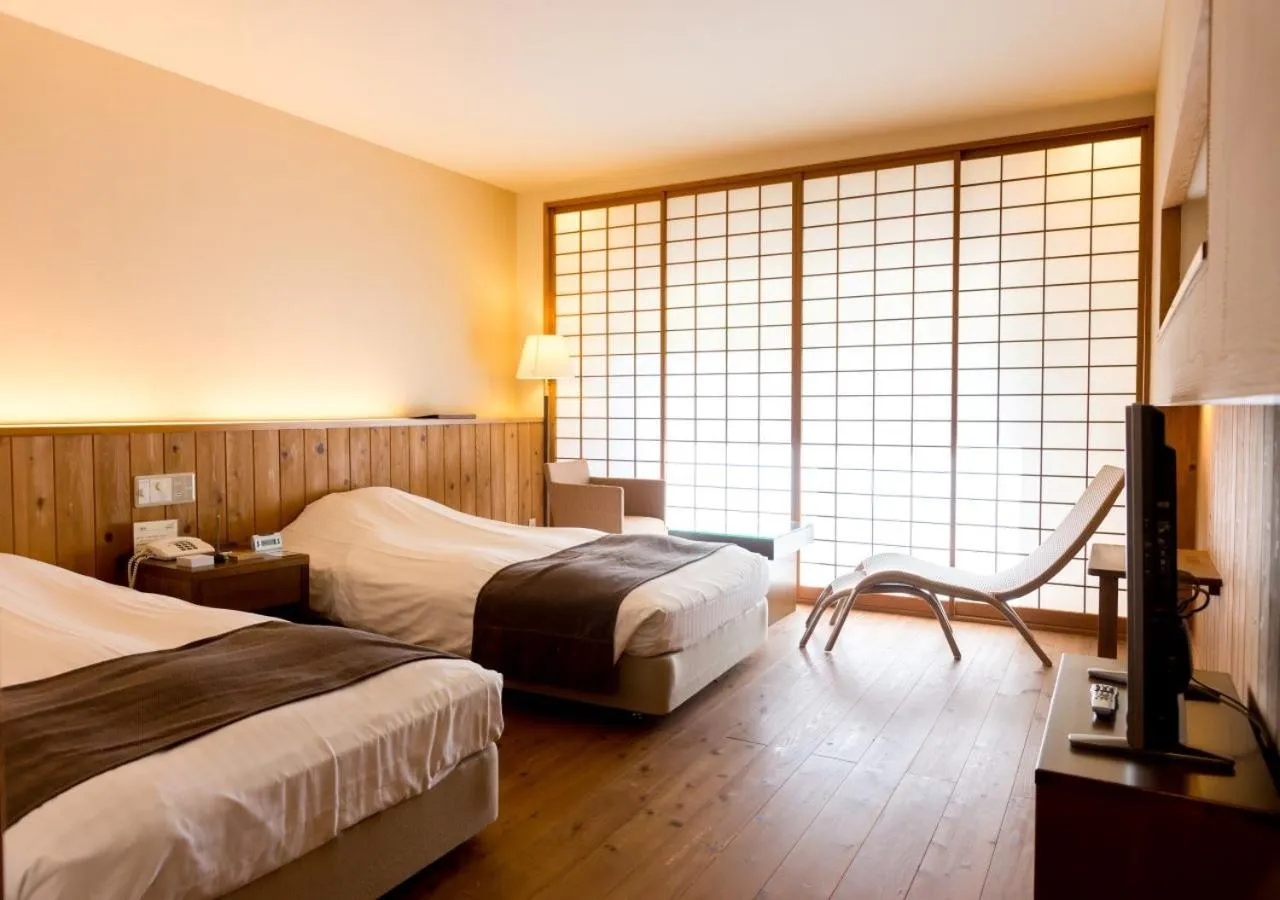 Bed in Yatsugatake Hotel Fuuka