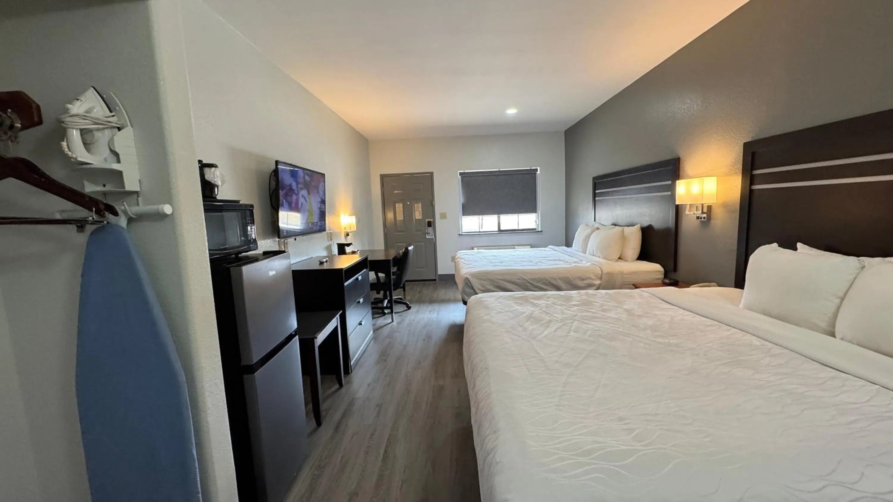 Bed in Sunbridge Inn & Suite Extended Stay