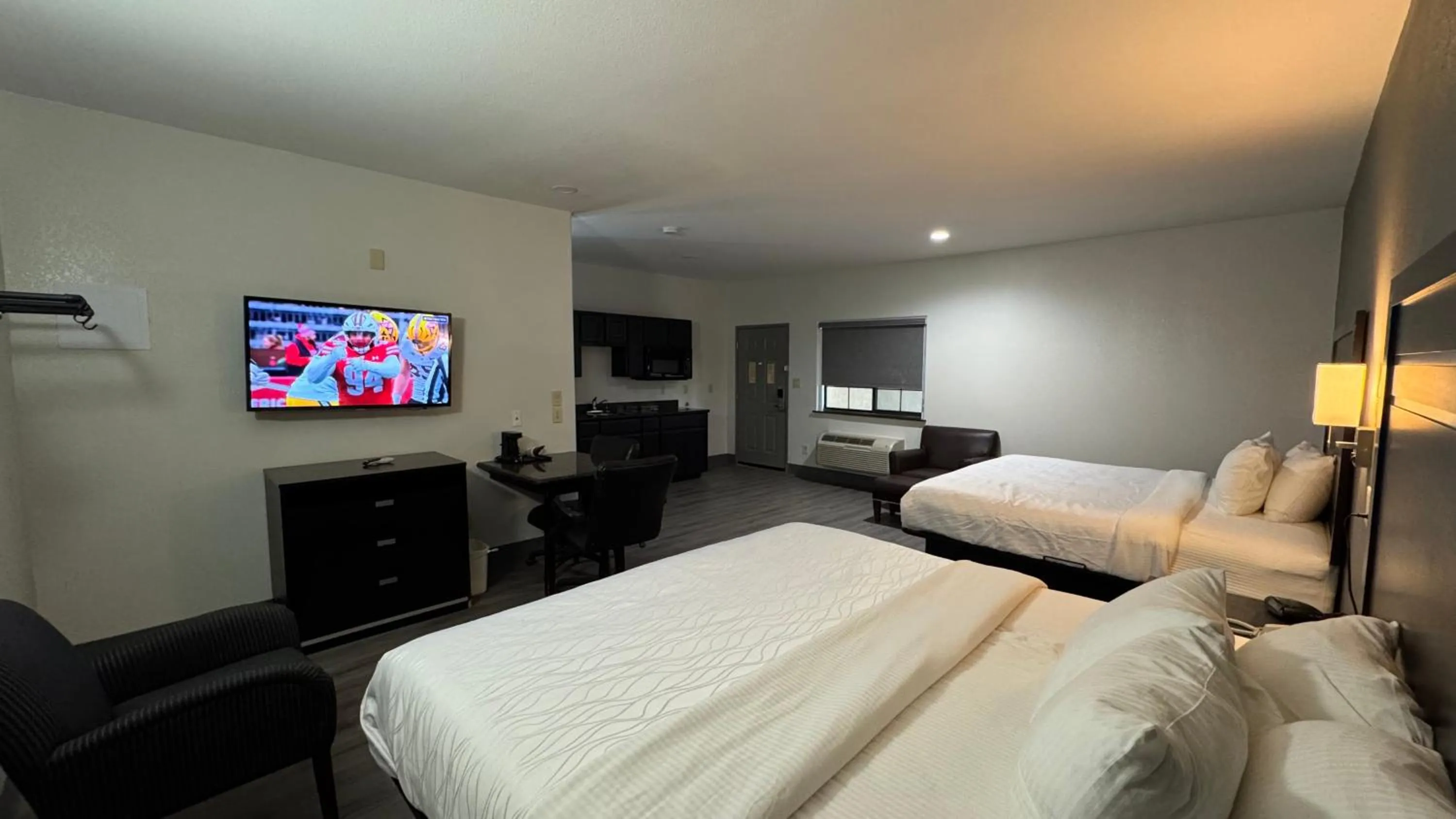 Bed in Sunbridge Inn & Suite Extended Stay
