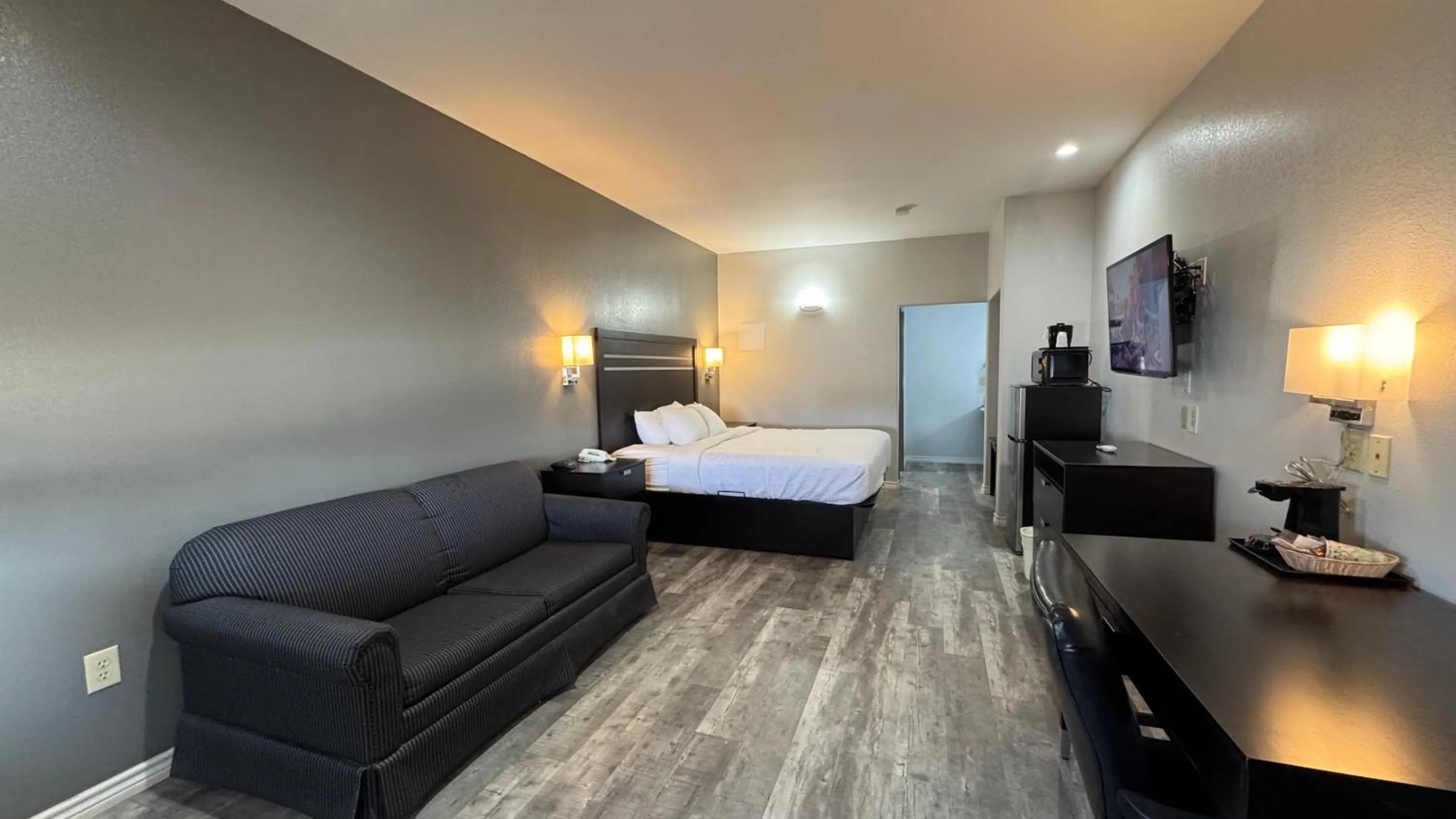 Bed in Sunbridge Inn & Suite Extended Stay