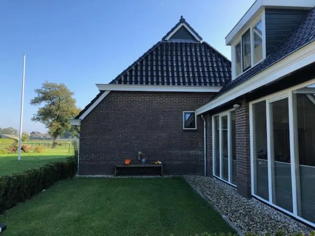Property building in Bed en Breakfast The Wooden Wall