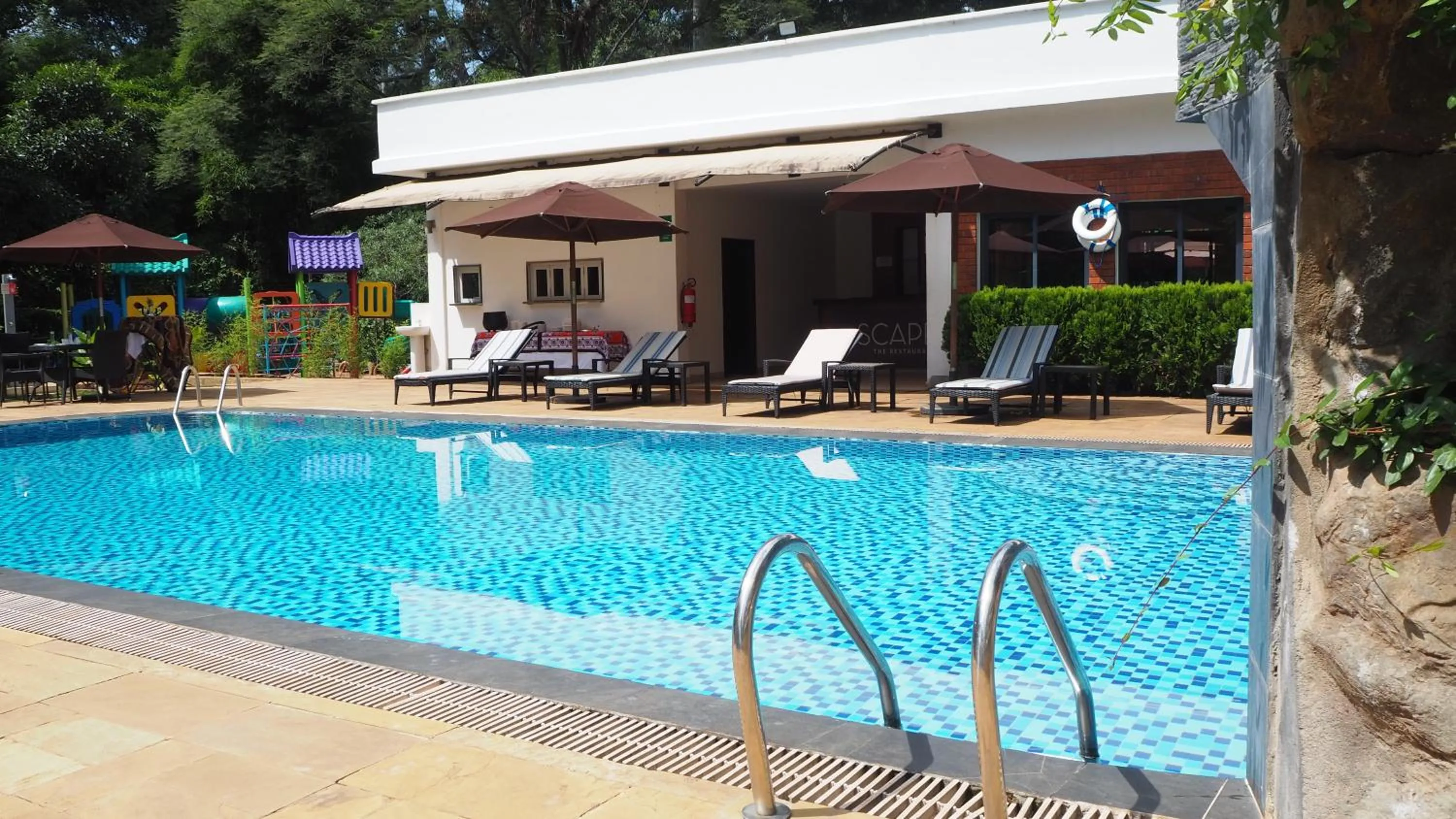 Swimming pool in Heri Heights Hotel Apartments, SureStay Collection by Best Western