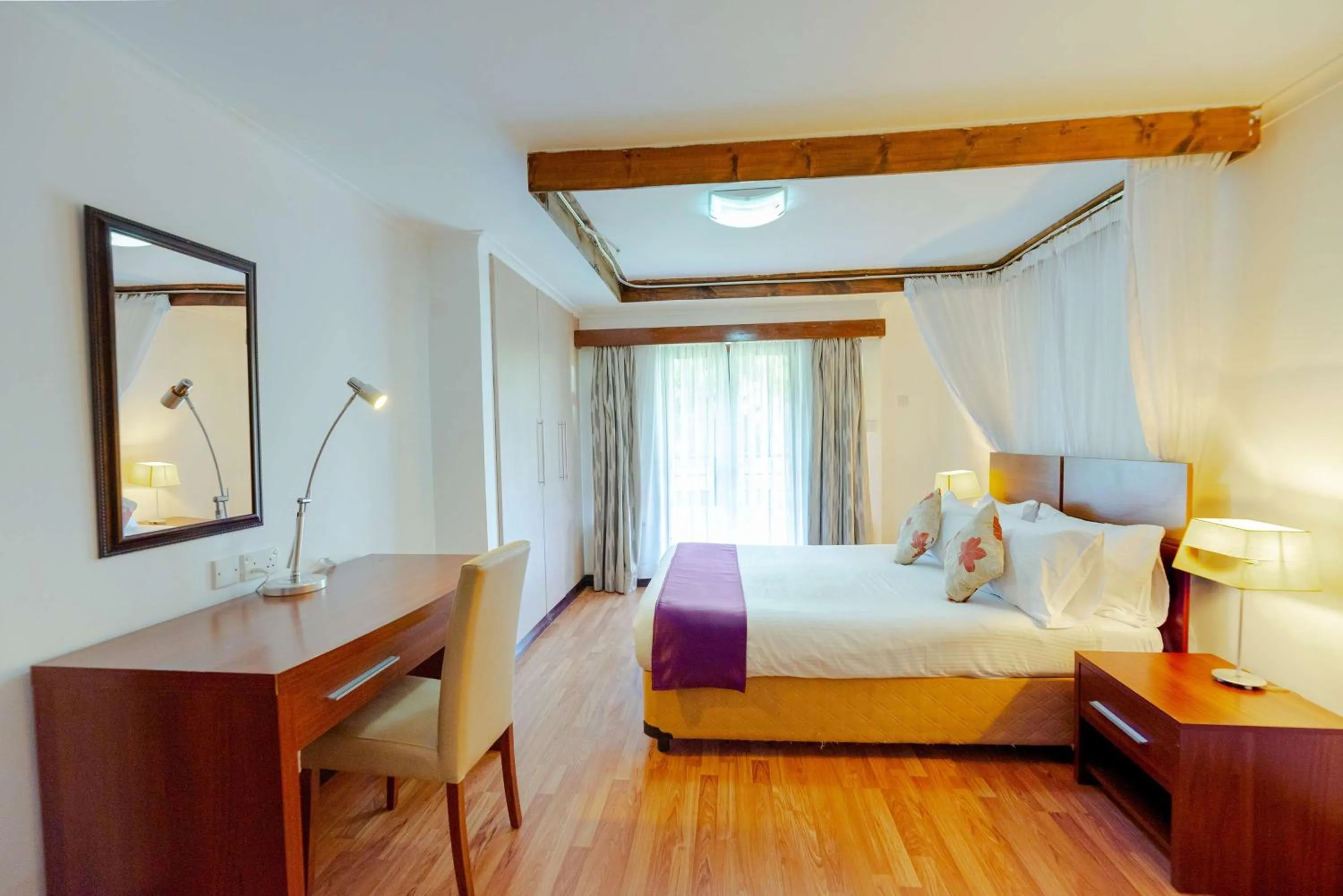 Bedroom, Bed in Heri Heights Hotel Apartments, SureStay Collection by Best Western