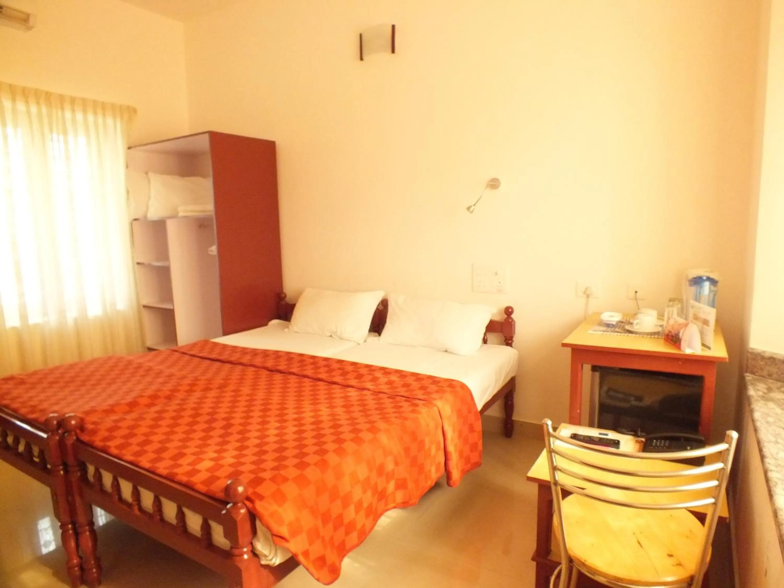 Photo of the whole room, Bed in Cherai Beach Residency