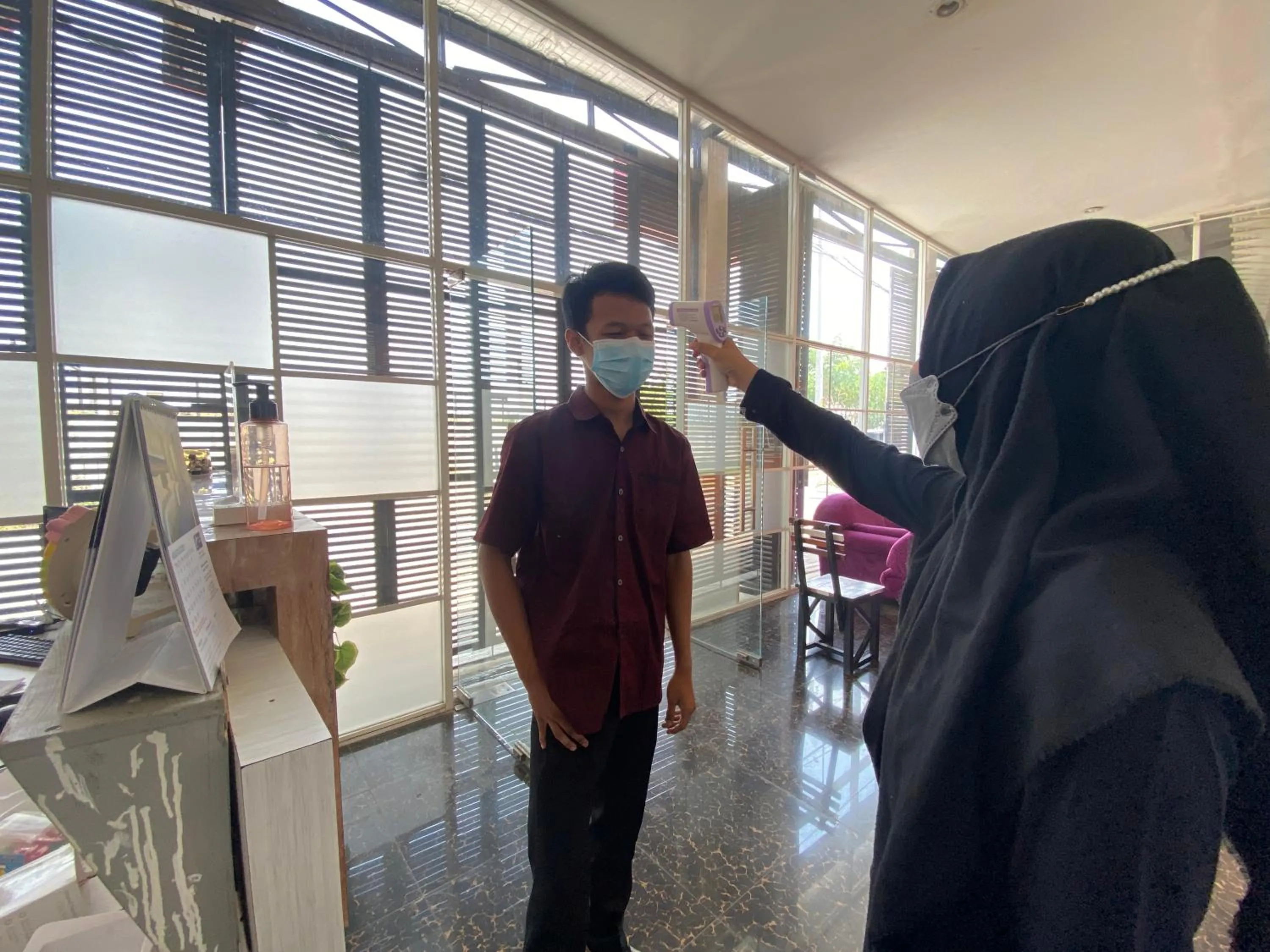 Staff in RedDoorz At Kartini Residence Semarang