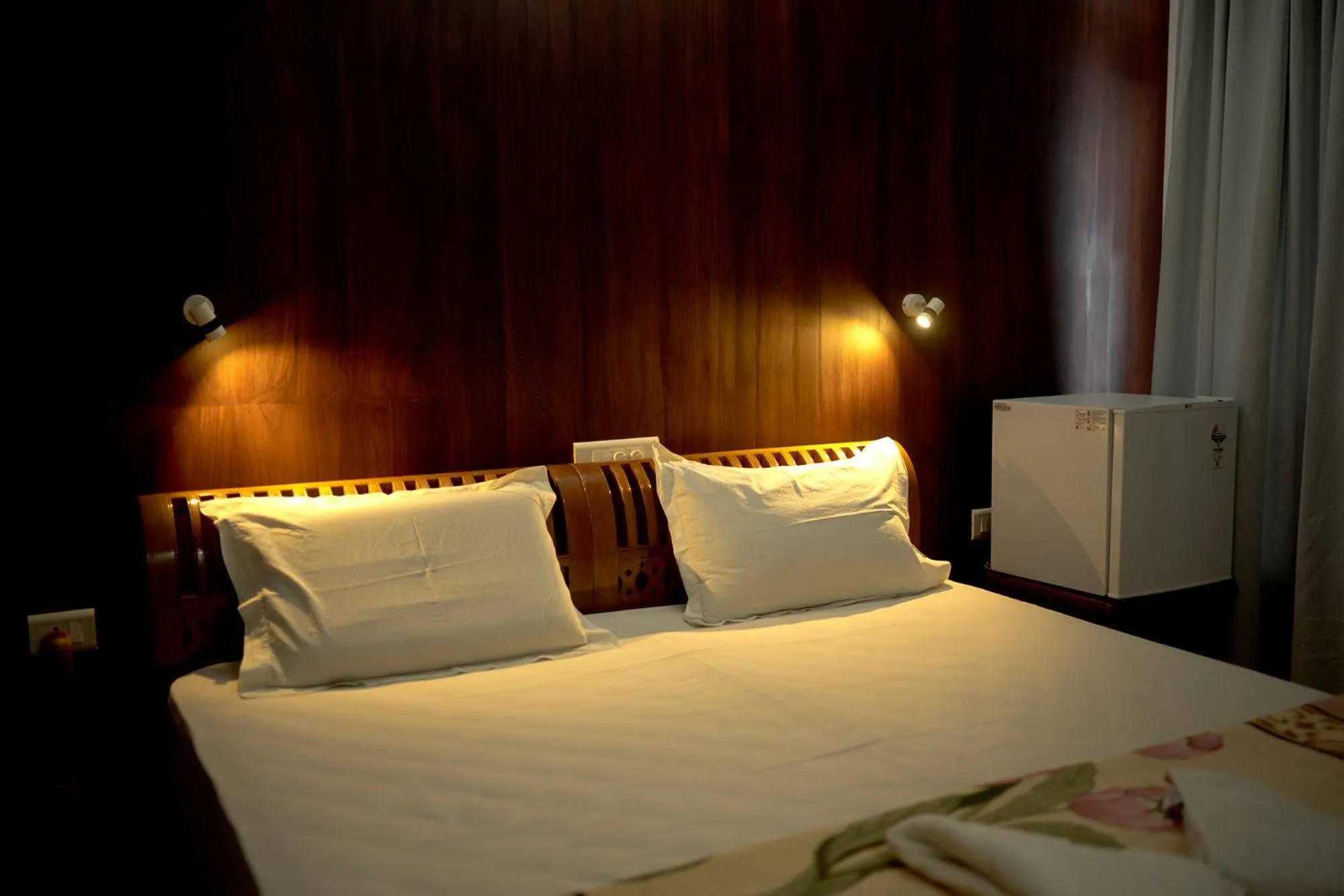 Bed in Vijaya Varma Beach Resort