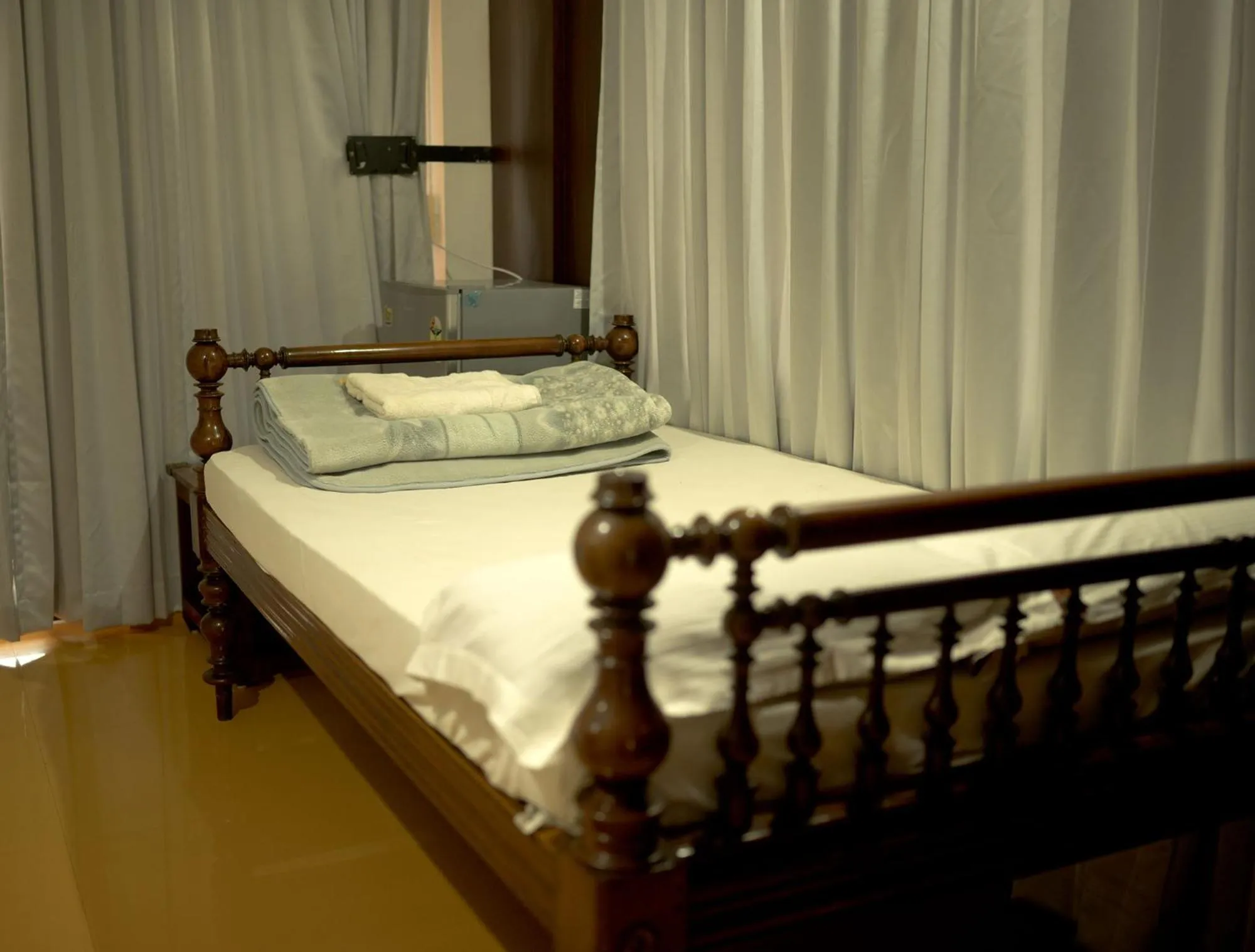 Bed in Vijaya Varma Beach Resort