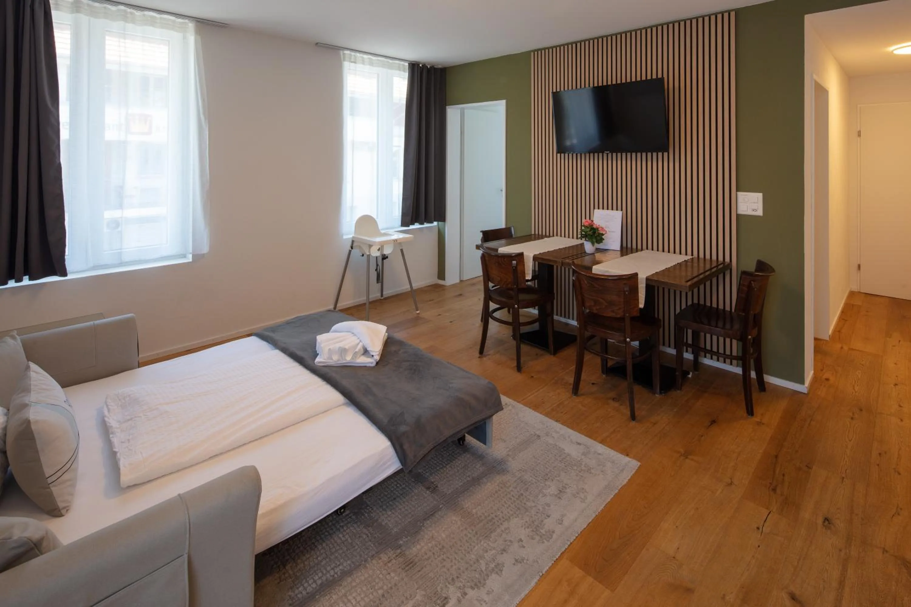 Bed in BERG & BERG APARTMENTS - Spiez Self-Check-in