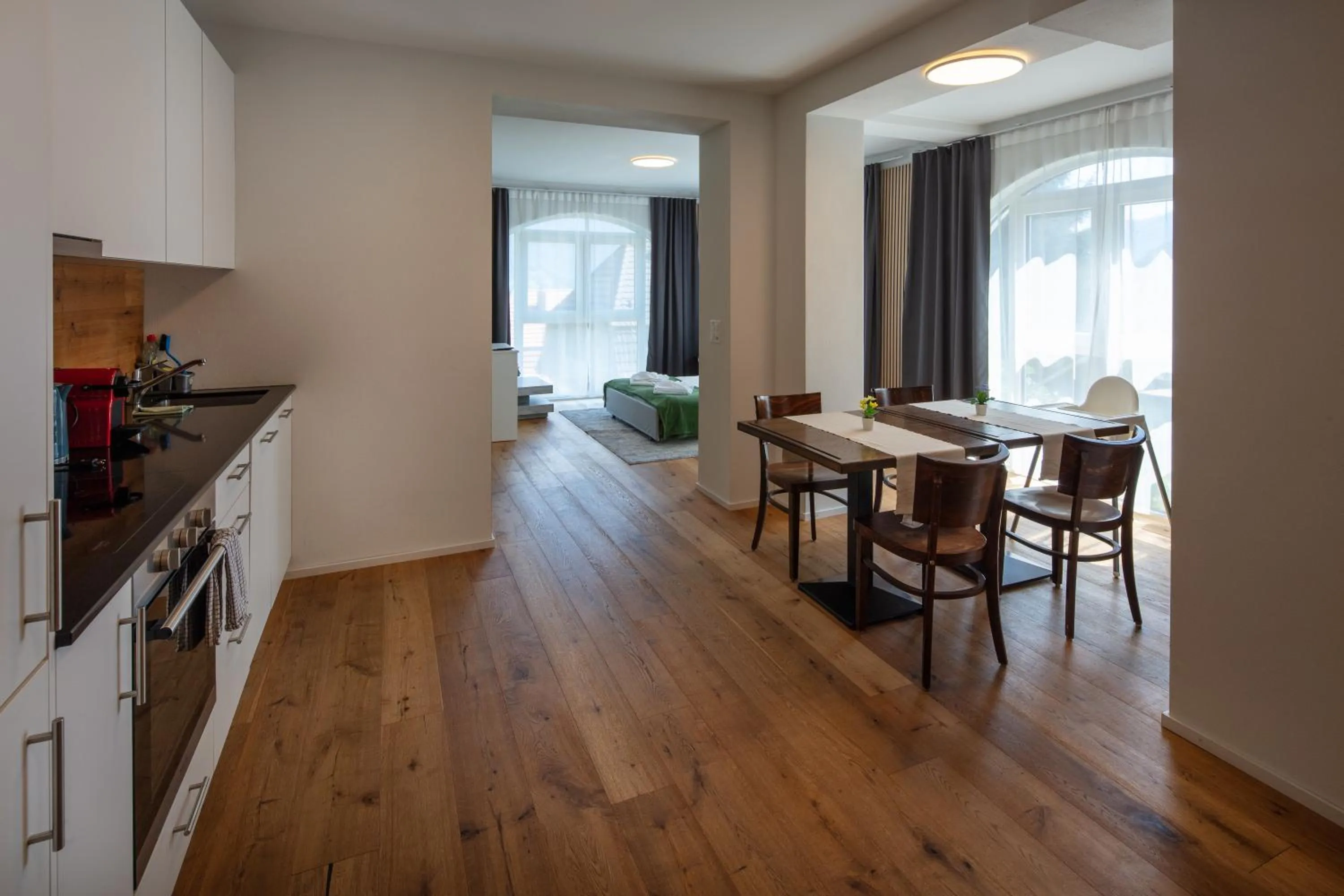 Kitchen or kitchenette in BERG & BERG APARTMENTS - Spiez Self-Check-in