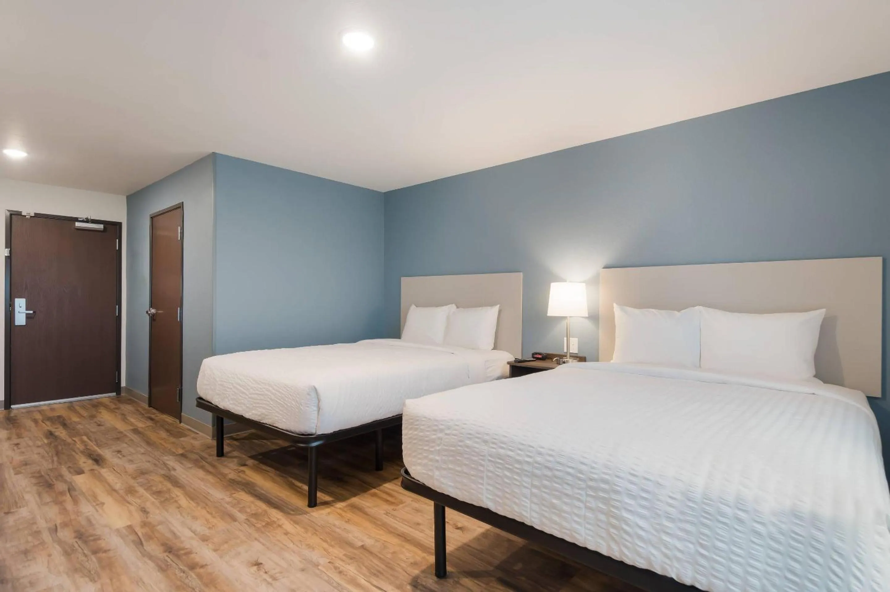 Bedroom, Bed in WoodSpring Suites Tampa Airport North Veterans Expressway