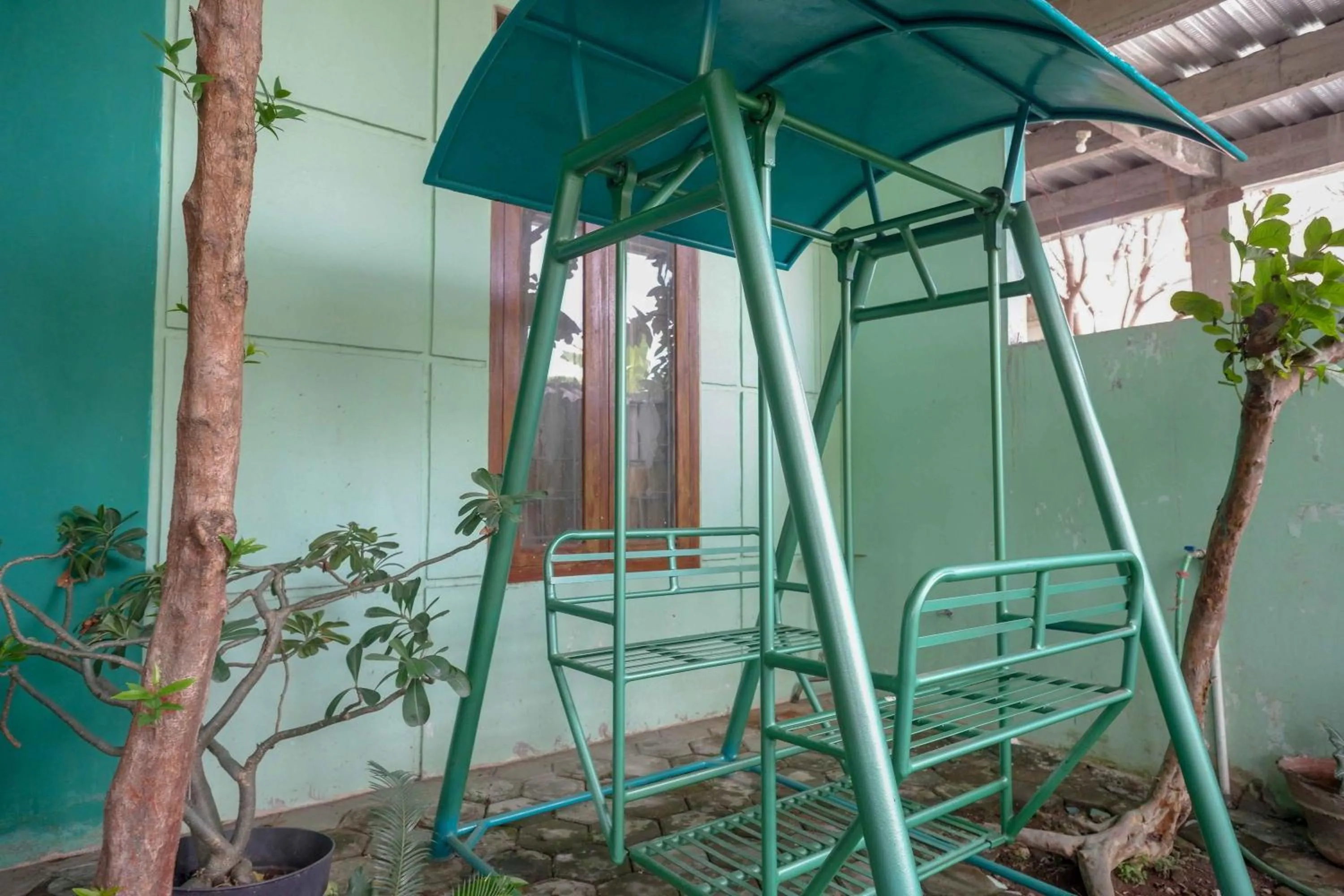 Children play ground in RedDoorz Syariah near RS Mitra Siaga